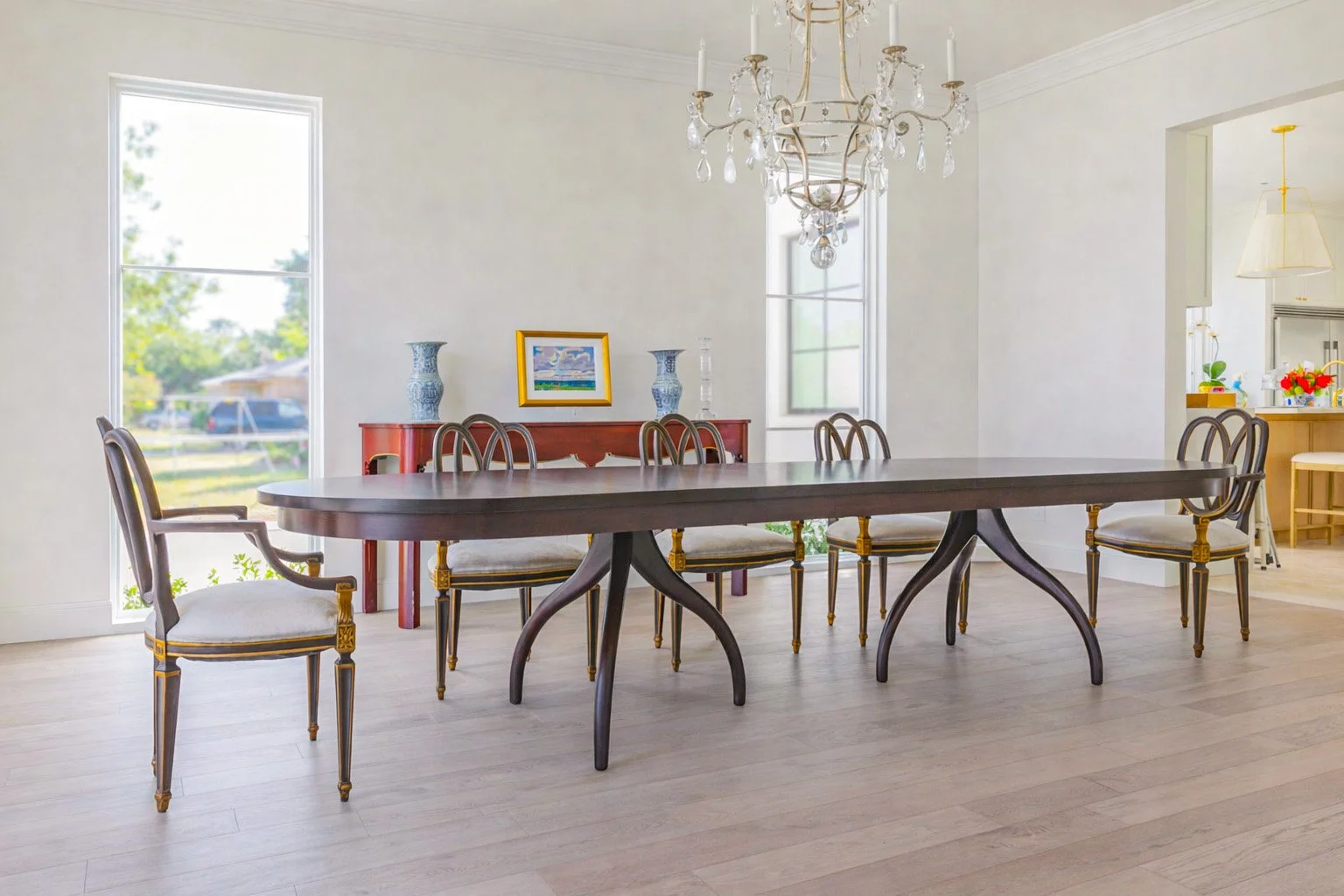 Custom carved leg dining table mahogany in a Nichols Hills home