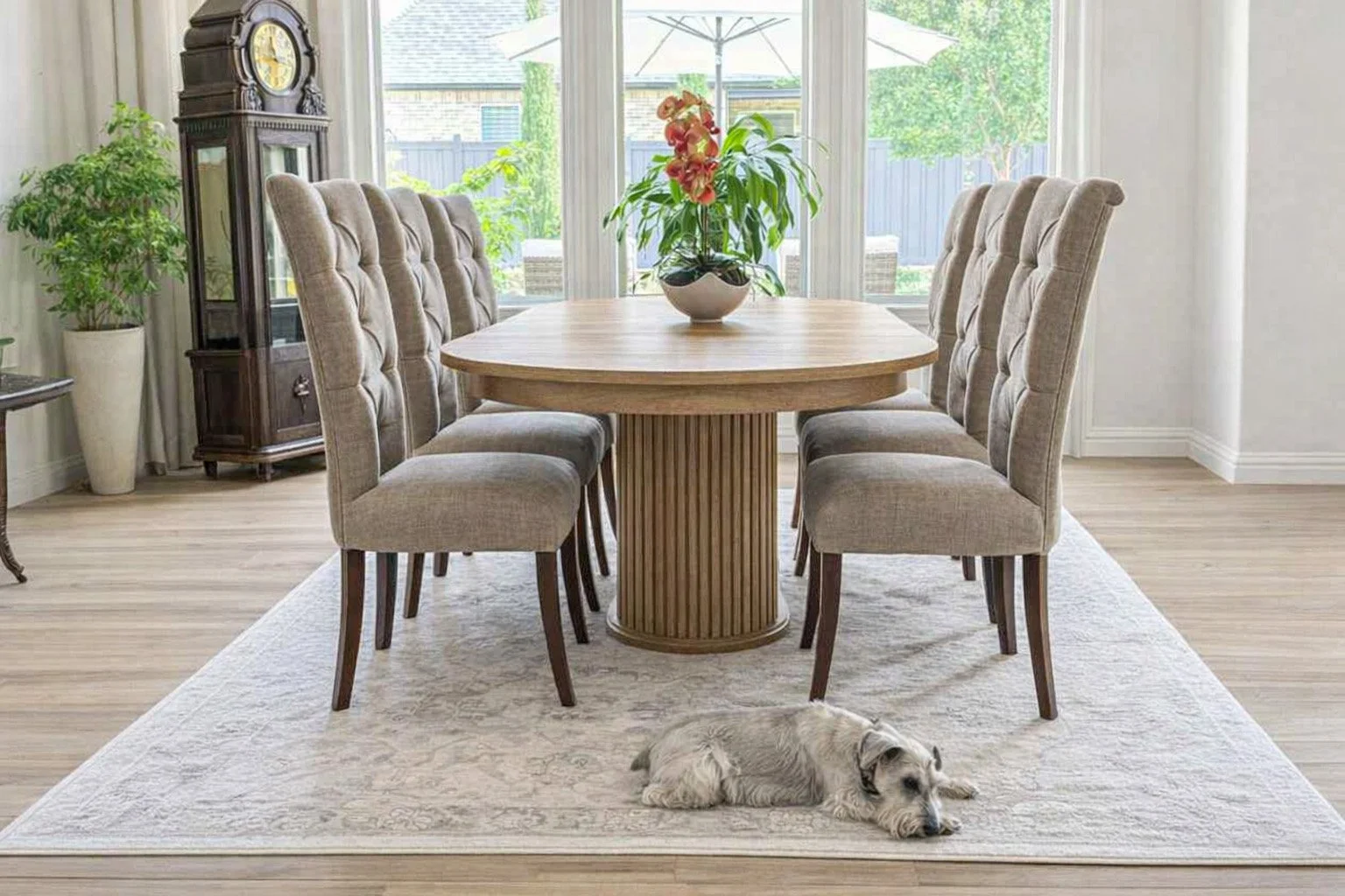 An oval White Oak Olivia dining table staged in an Edmond, Oklahoma home
