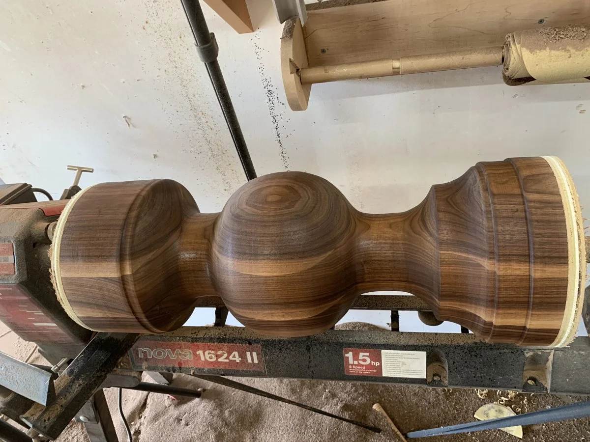 An newly completed Walnut pedestal on the lathe