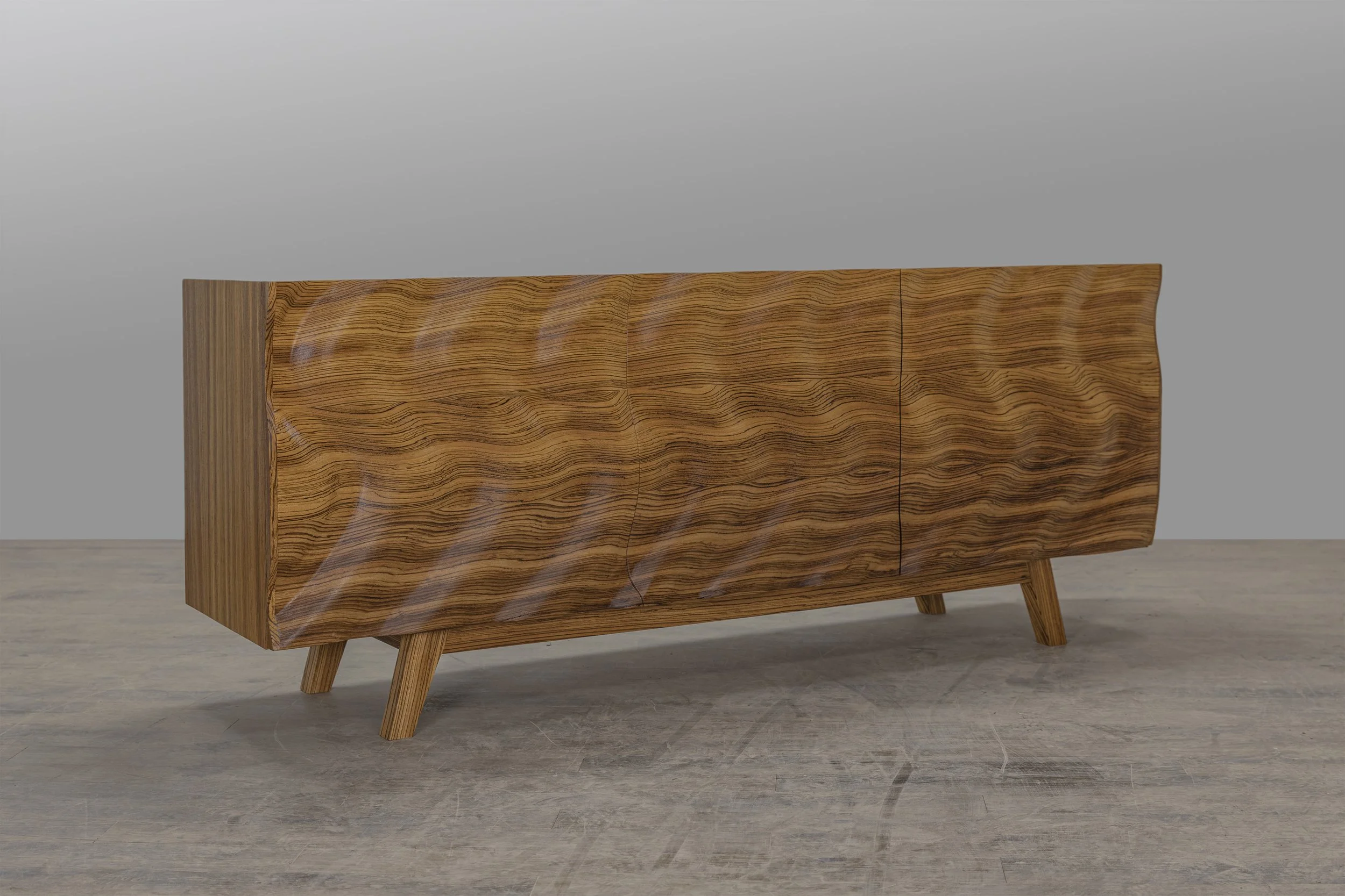 Wave face console from Zebrawood