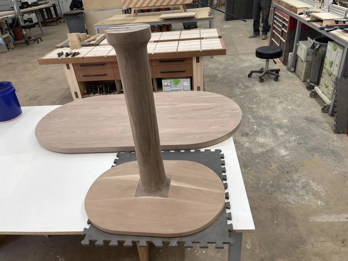 A gorgeous little solid Walnut tulip table waiting on final sanding