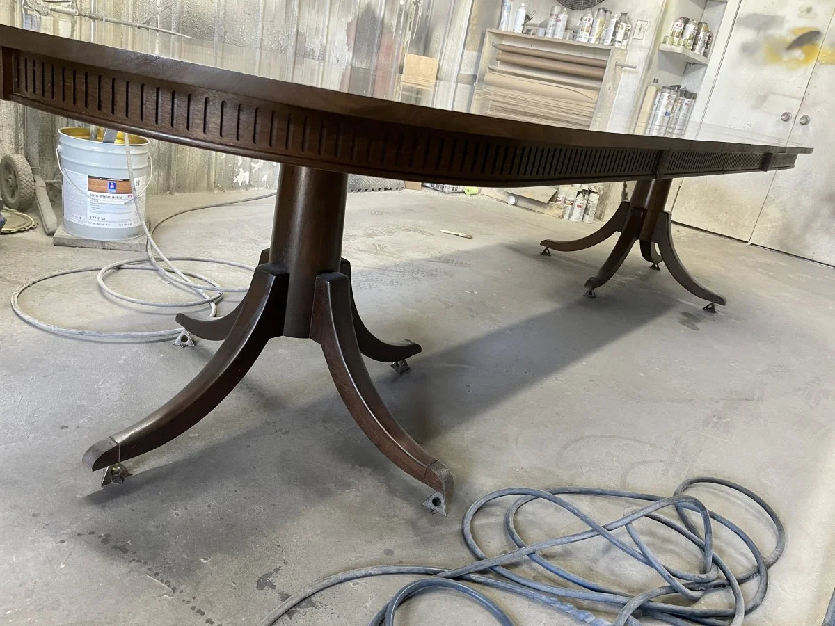 A complete Phyfe inspired table in the booth getting its final coats of catalyzed lacquer