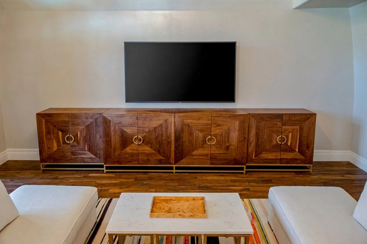 Large Walnut media console in an Oak Tree home