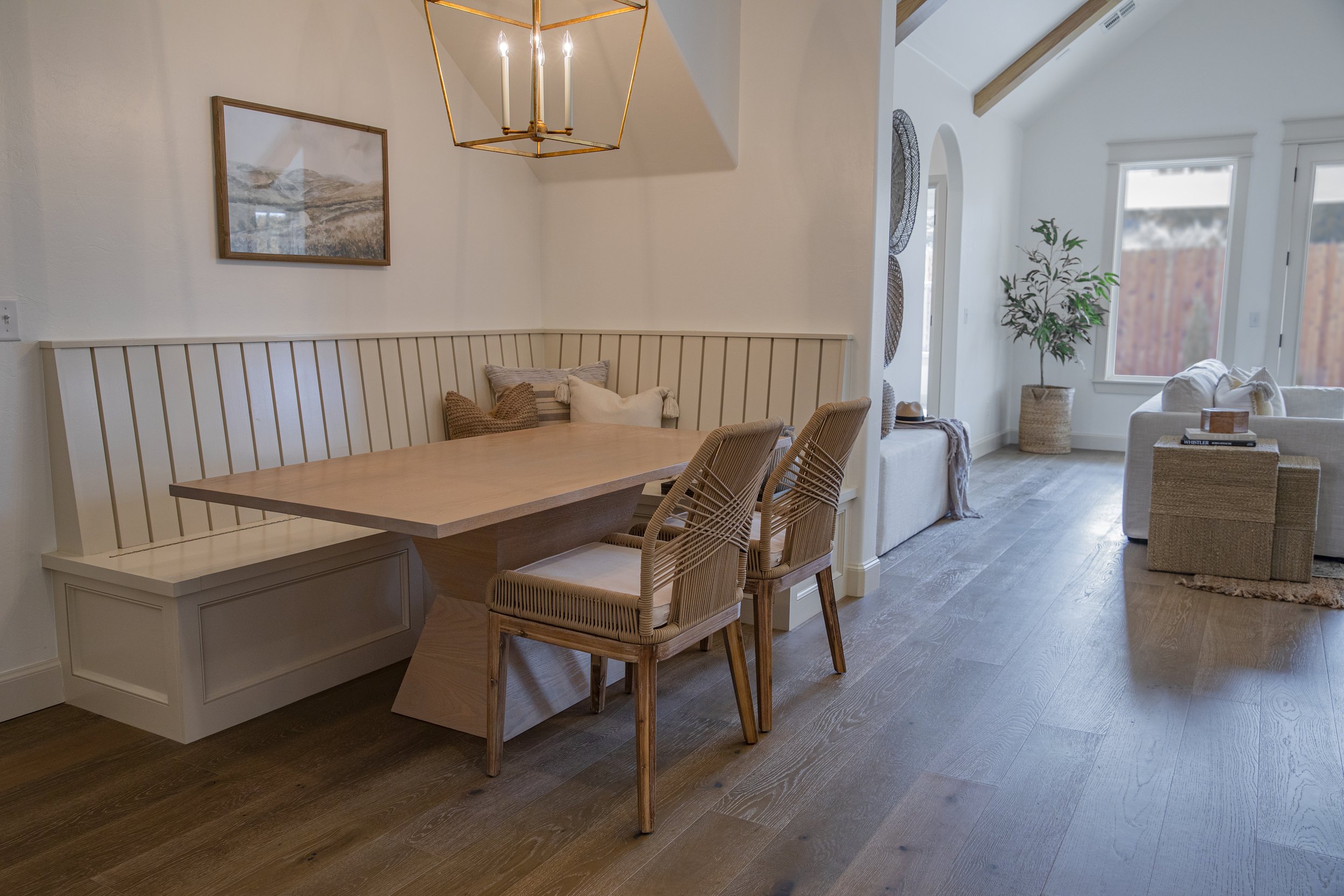 White Oak Ingrid Dining table set into a banquette seating area