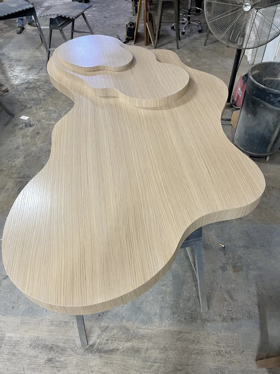 The cloud coffee table after its first coat of matte lacquer