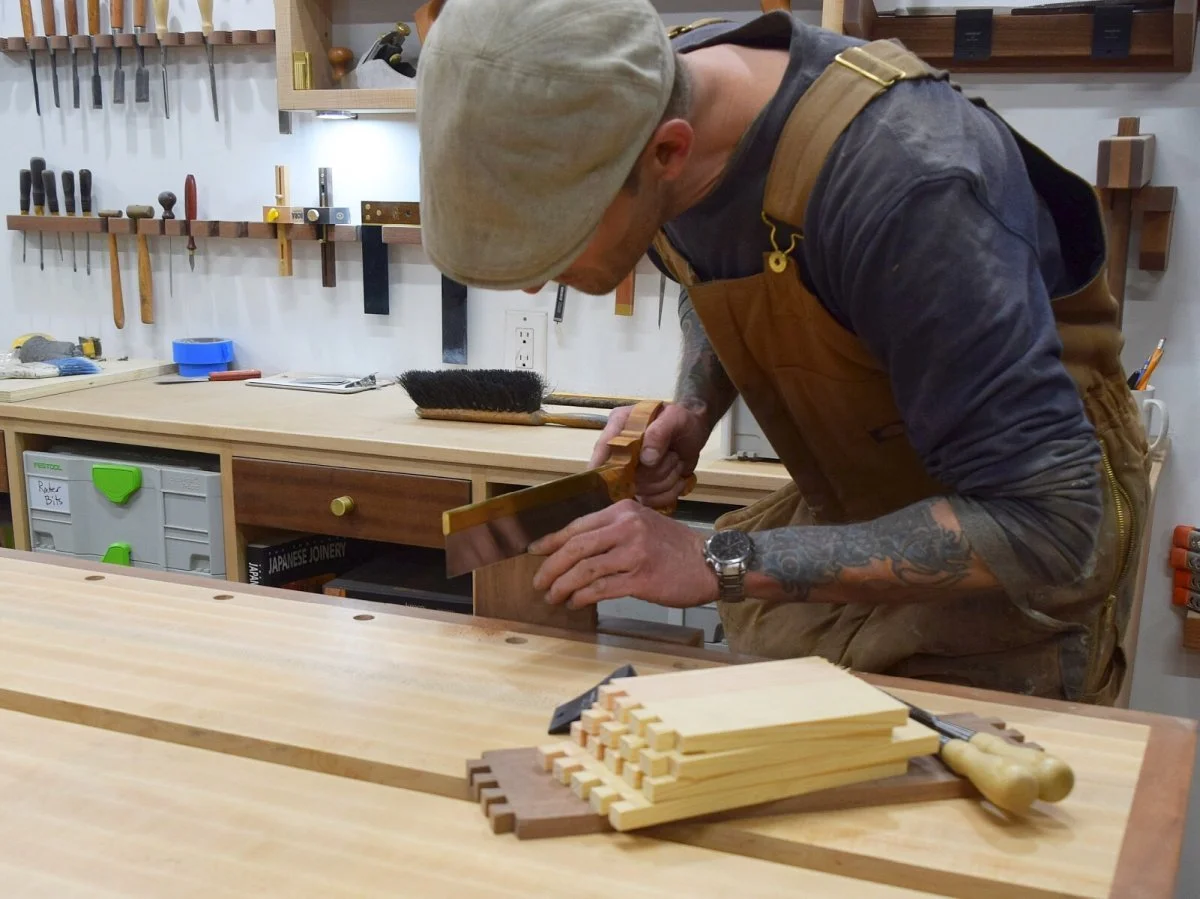 Me hand-cutting dovetails for a large dresser piece