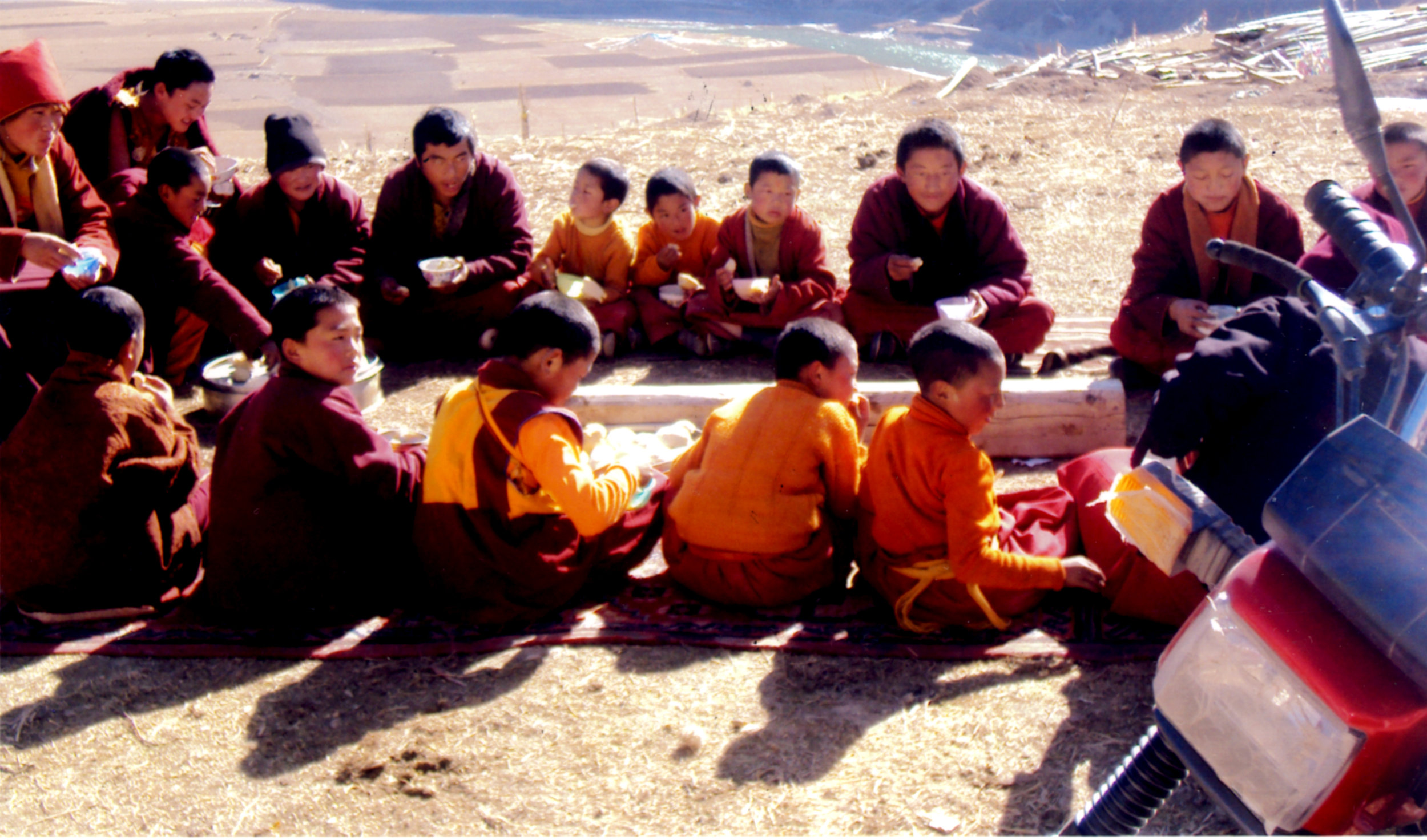 11 singi village school monks eating lunch.jpg