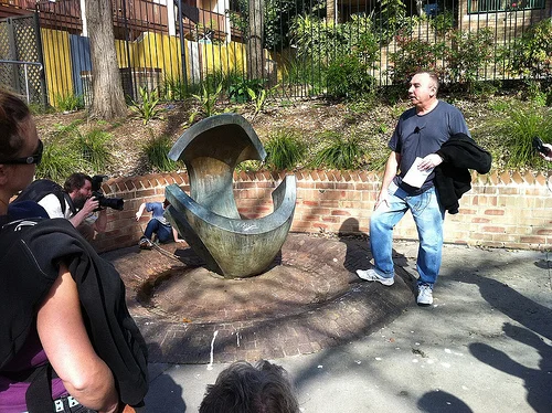 Artist Christopher Dean discusses the sculpture ‘Aphrodite’ by Margel Hinder, in the park at Sir Dennis Winston Place.
