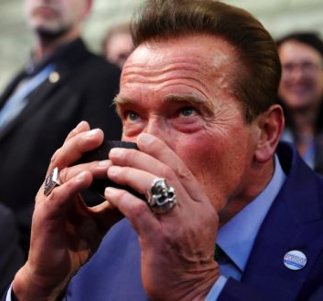 Arnold Schwarzenegger drinking kava at the climate change summit in Germany (2017)