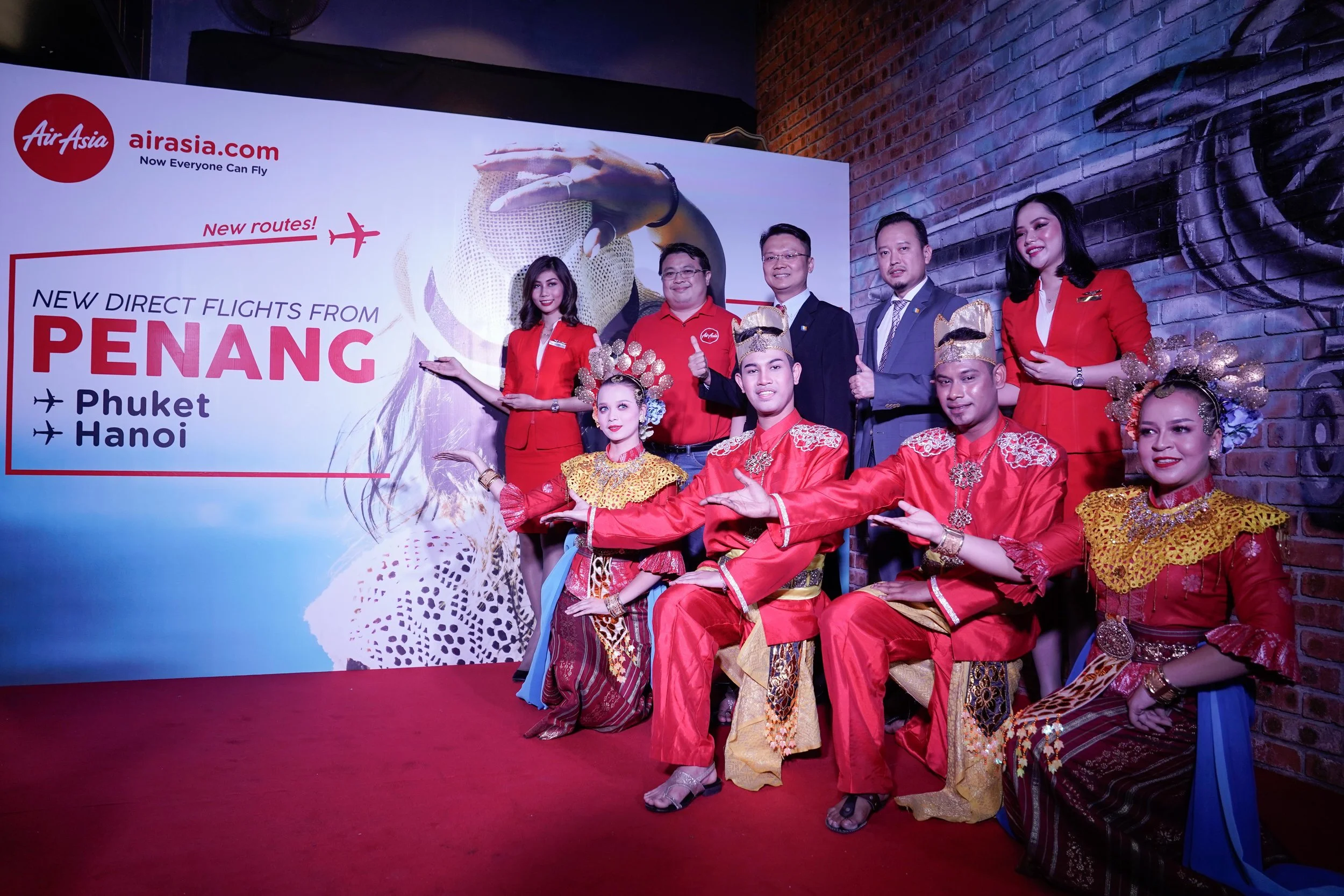 Photo Caption (From top second left to right): AirAsia Malaysia Head of Commercial Spencer Lee, Penang State Executive Councillor for Tourism Development, Heritage, Culture and Arts YB Yeoh Soon Hin, and Penang Global Tourism CEO Mr. Ooi Chok Yan celebrating the two inaugural international flights from Hanoi and Phuket into Penang.