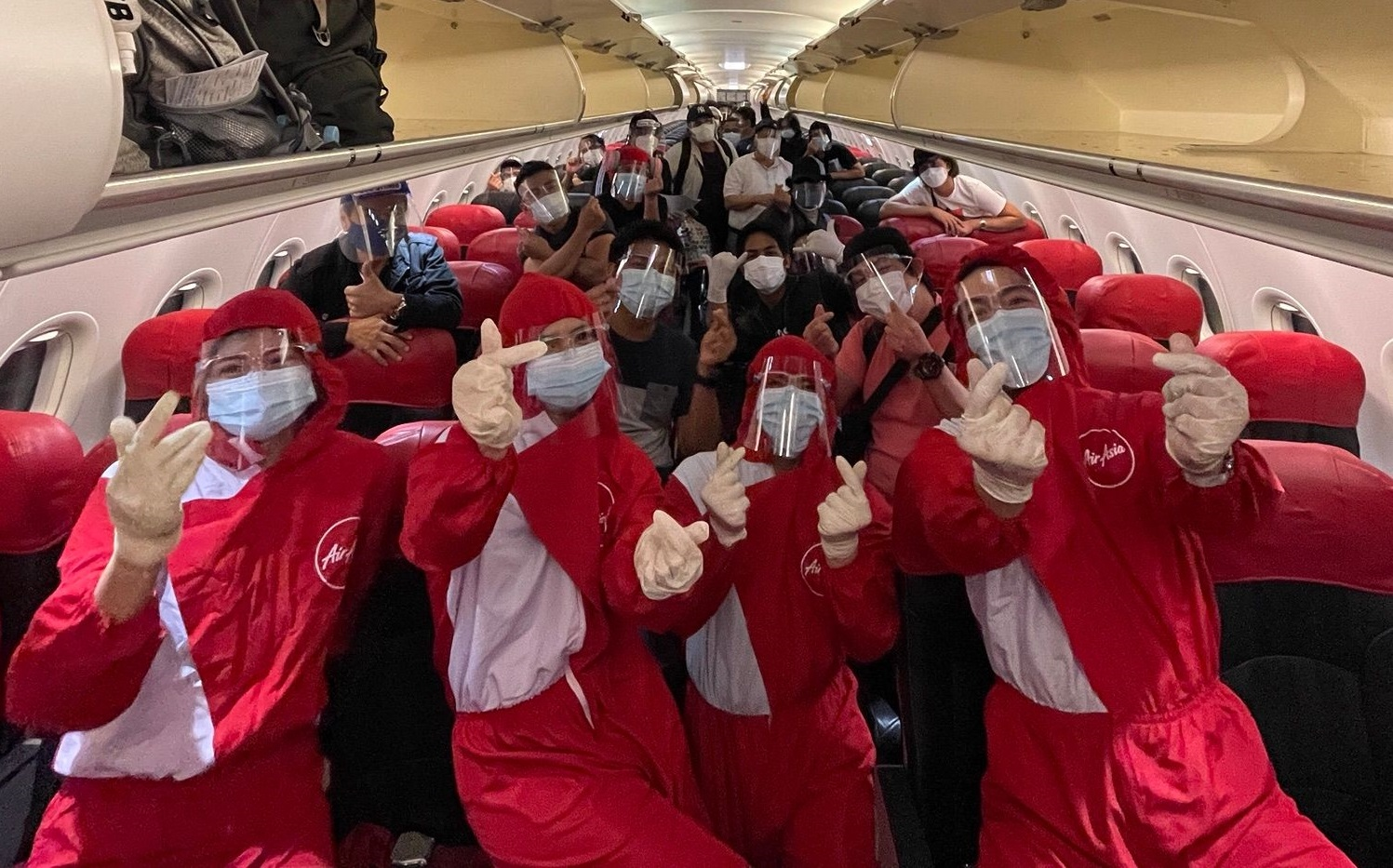 AirAsia Philippines gifts 100 OFWs with FREE flights to Singapore and Manila 