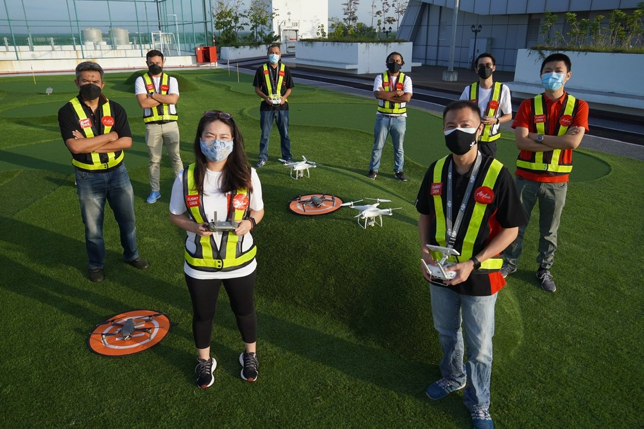  Photo Caption: (Front right) AirAsia Group Chief Safety Officer, Captain Ling Liong Tien with the rest of airasia Unmanned Aircraft System (UAS) team. 