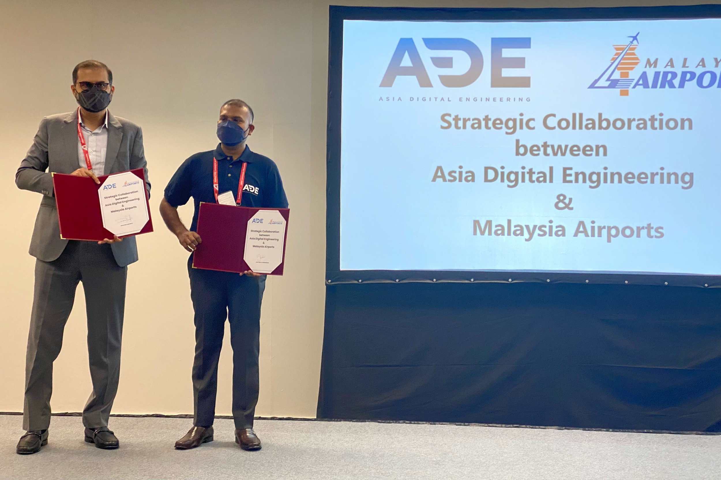  Photo Caption: (From left) Mr Randhill Singh, Head of KLIA Aeropolis Sdn Bhd and Mahesh Kumar, CEO of ADE at the document exchange ceremony at the 2022 Singapore Airshow today. 