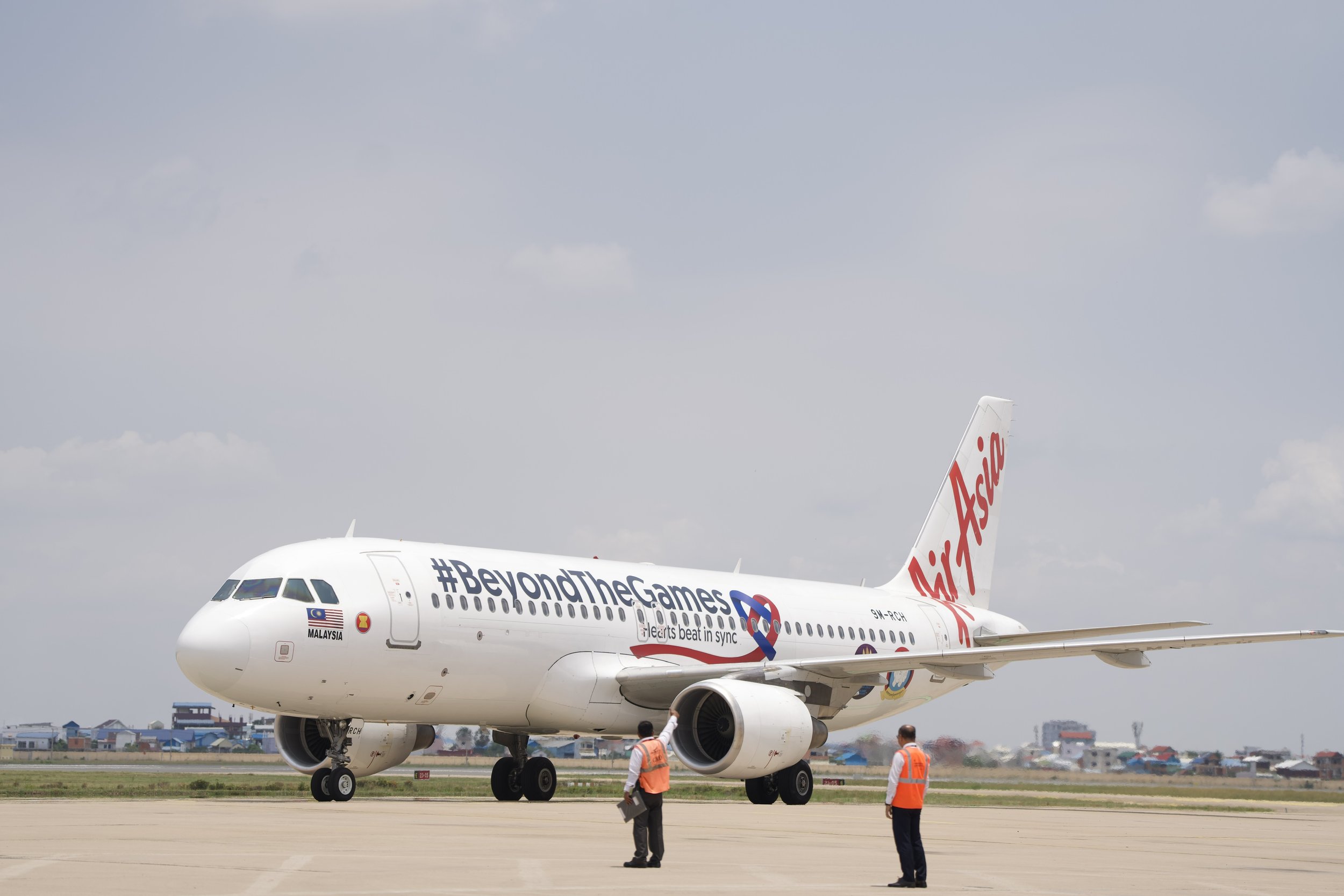 Photo Caption; AirAsia #BeyondTheGames Livery landing at Phnom Penh International Airport today.