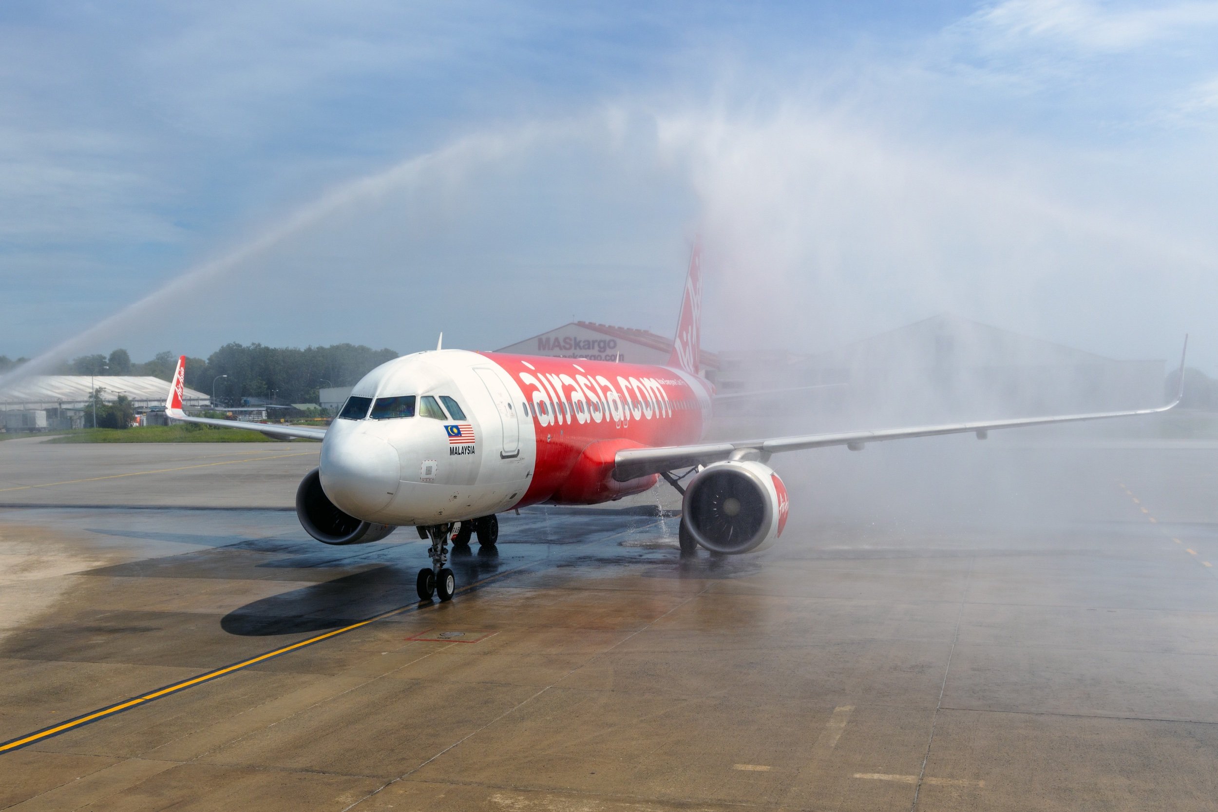  Photo Caption: AirAsia flight AK1302 from Macao greeted by water cannon salute upon landing at Kota KInabalu International Airport on Sunday afternoon. 