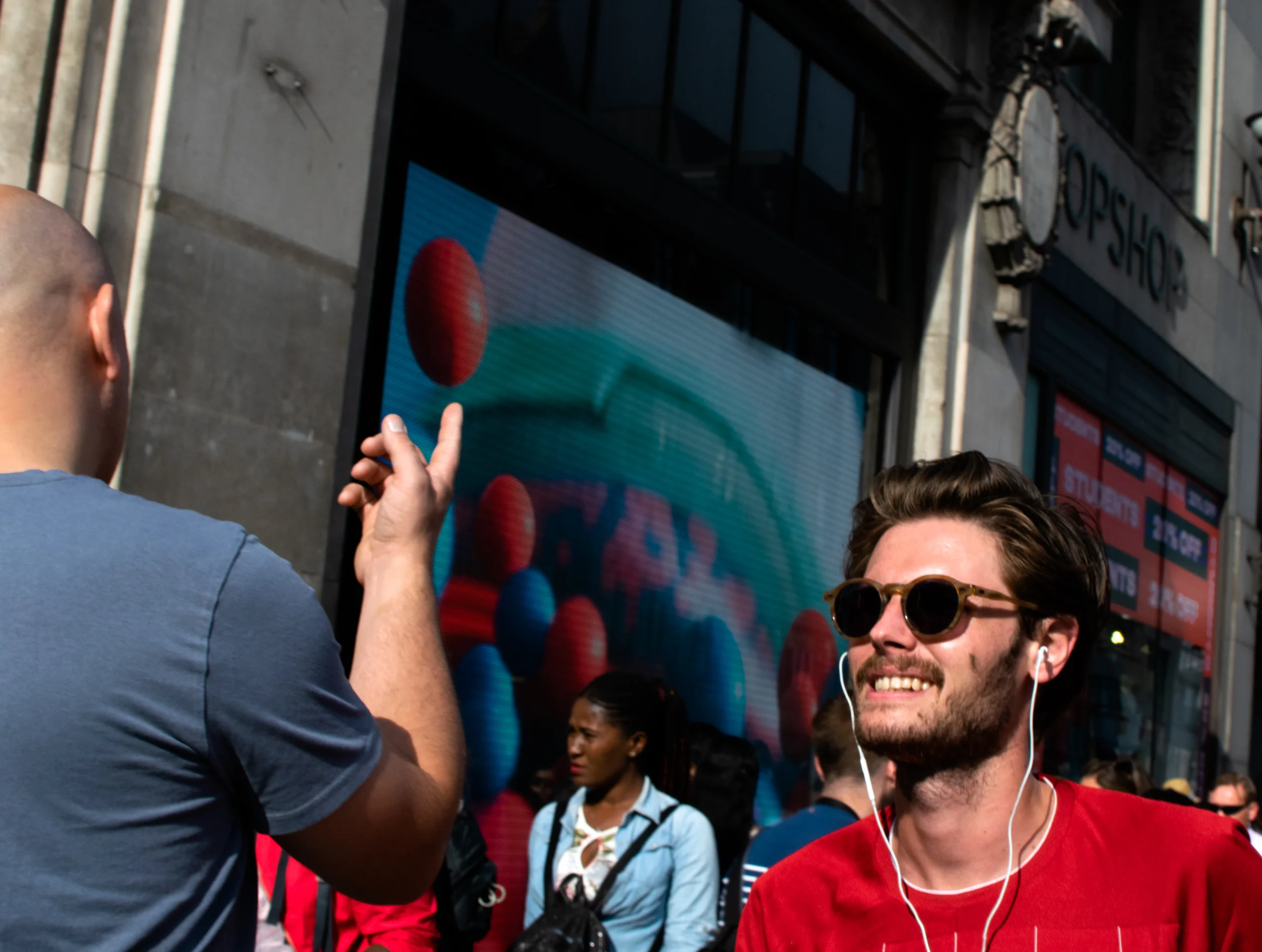 Red ball goes by, London, Aug 2019
