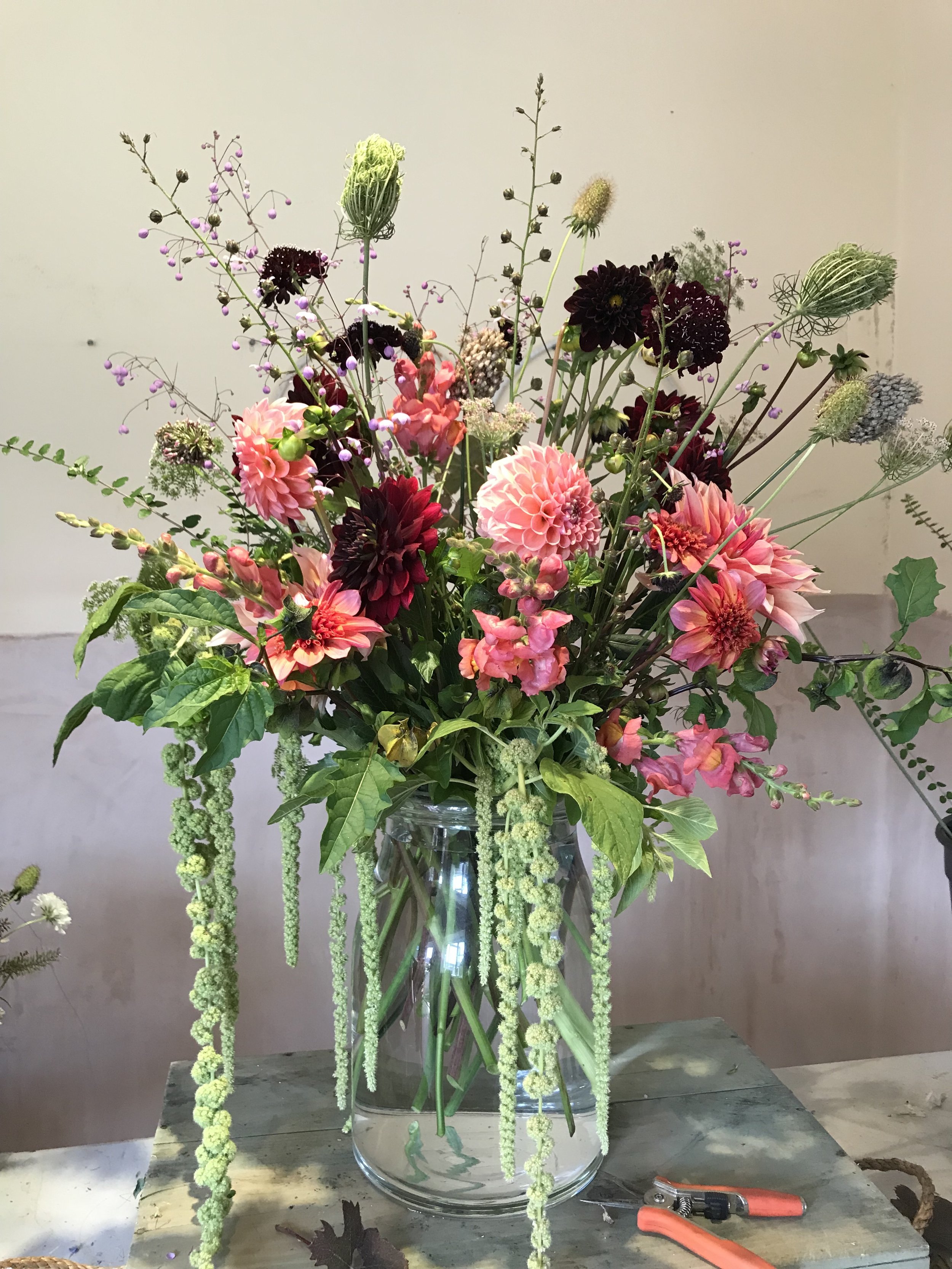 Large vase arrangement of summer flowers