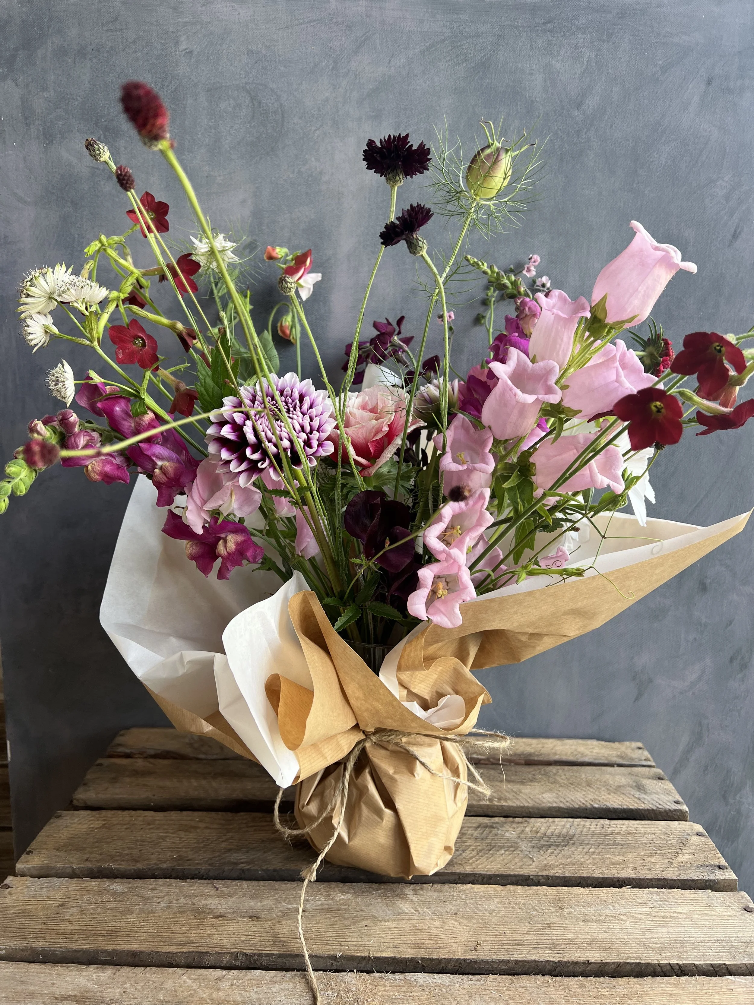 July medium jam-jar of flowers