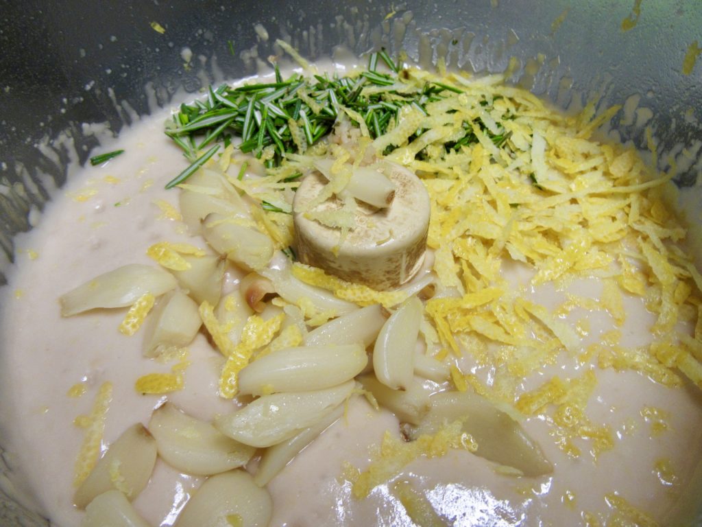 Add little rosemary, lemon zest, lemon juice, pinch of cayenne pepper, salt and little tahini. Mix everything into fantastic spread.