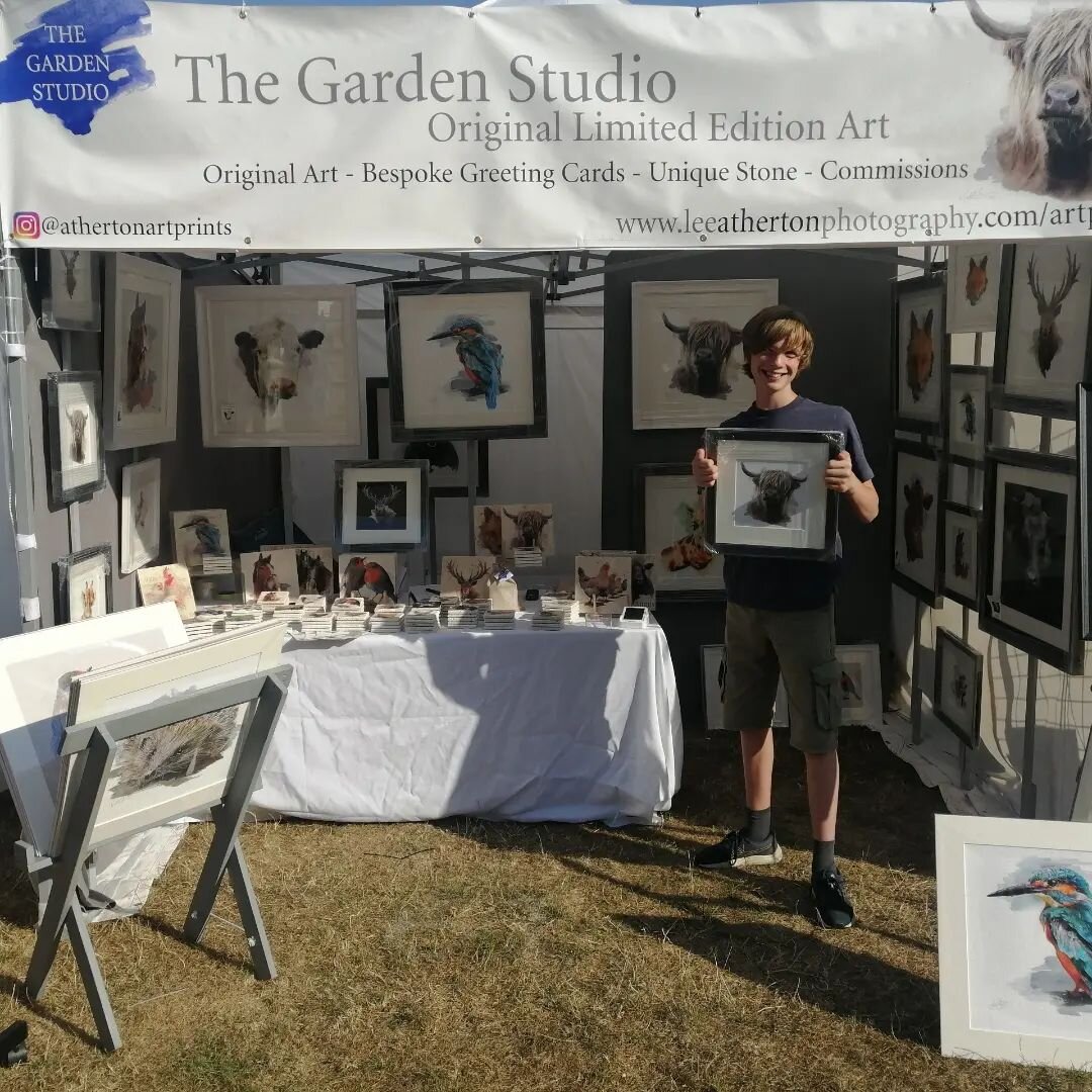 It's Art In The Park in Leamington Spa. We are all set up and ready. My sales assistant is looking good...