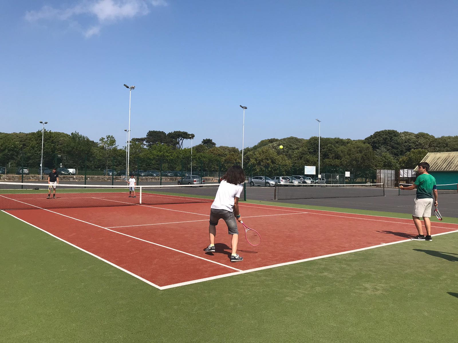 Students playing tennis