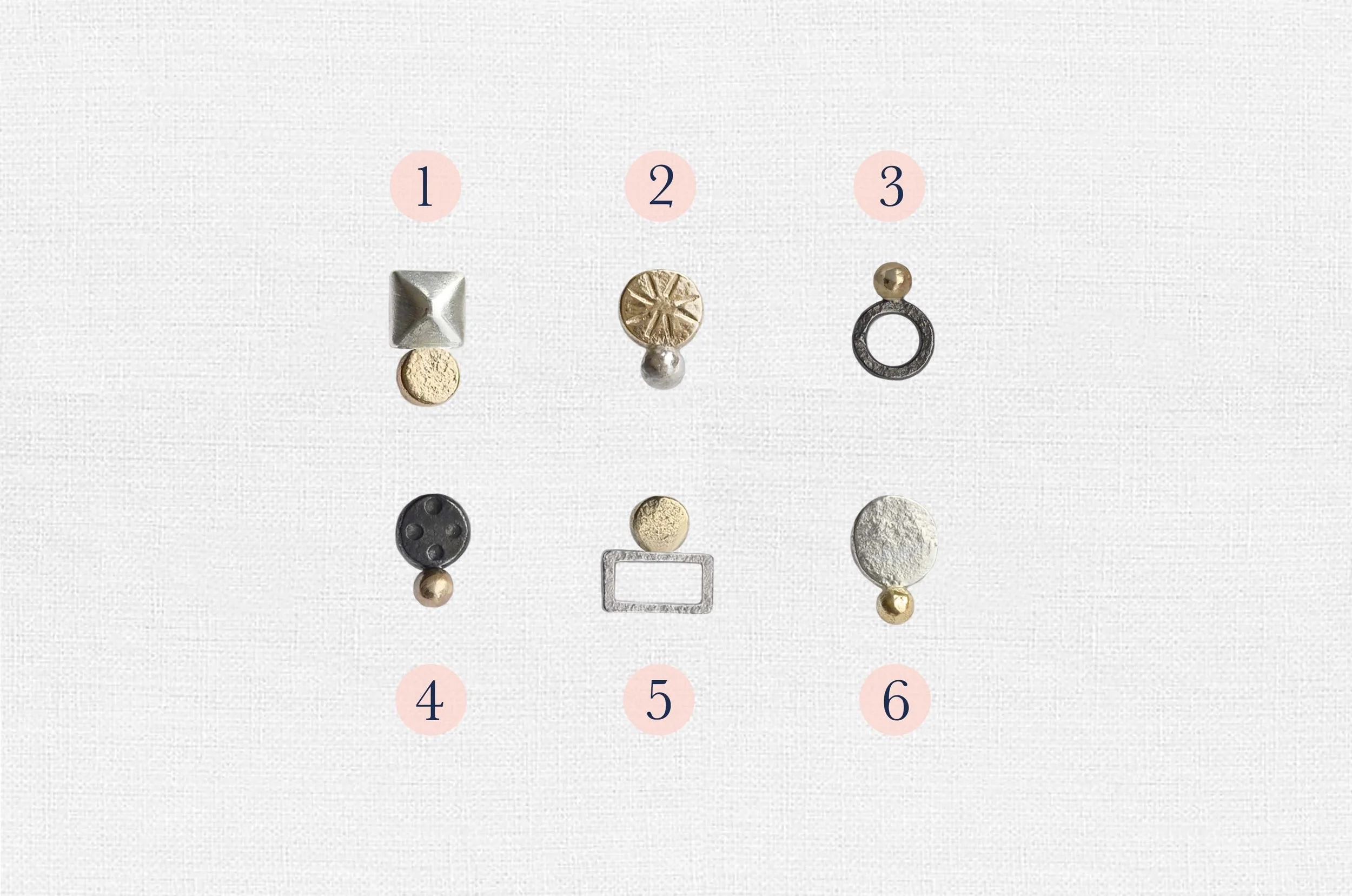 A set of six different studs made up of different shapes; rectangles, circles and squares. Added interest comes from the mismatched colours, featured 9ct gold, silver and oxidised silver.