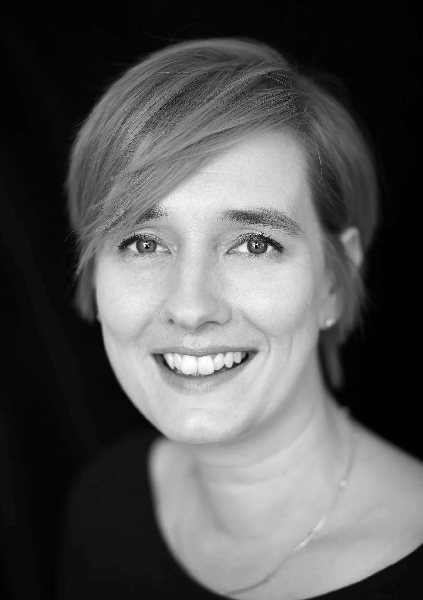 portrait of businesswoman on black background