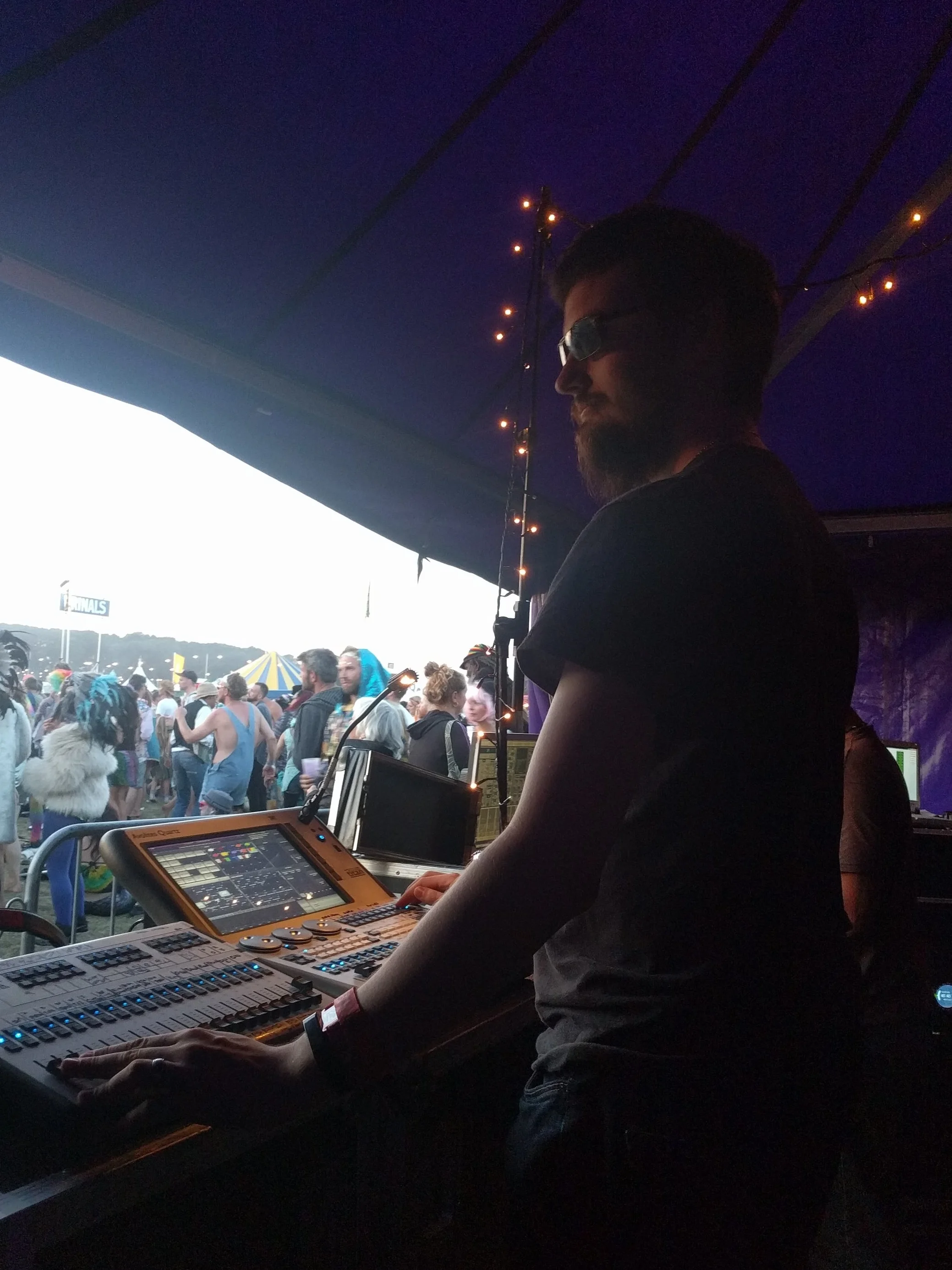 Robb operating lighting on the main stage at Shambala Festival 2017