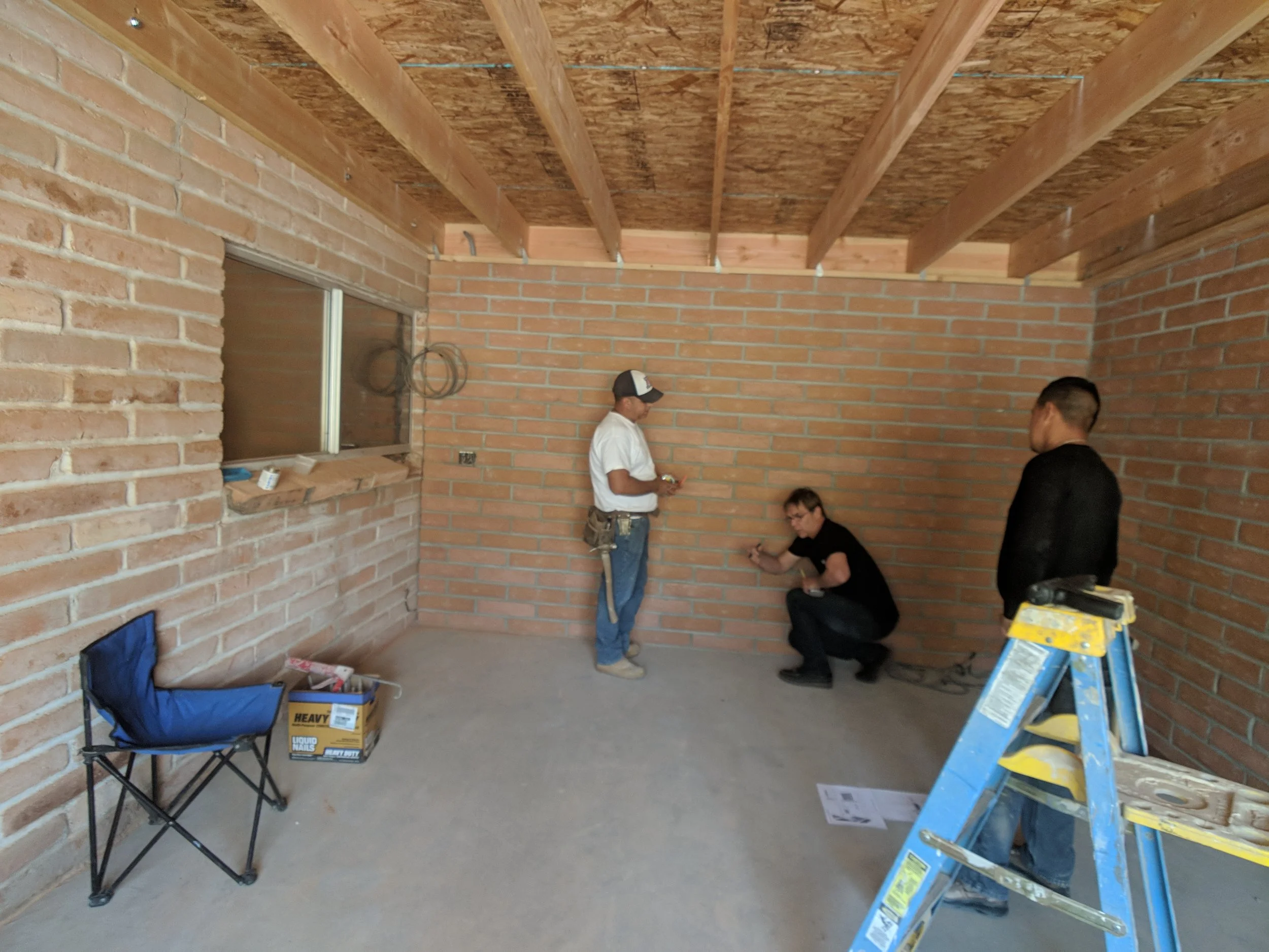 Beginning interior work on office addition.