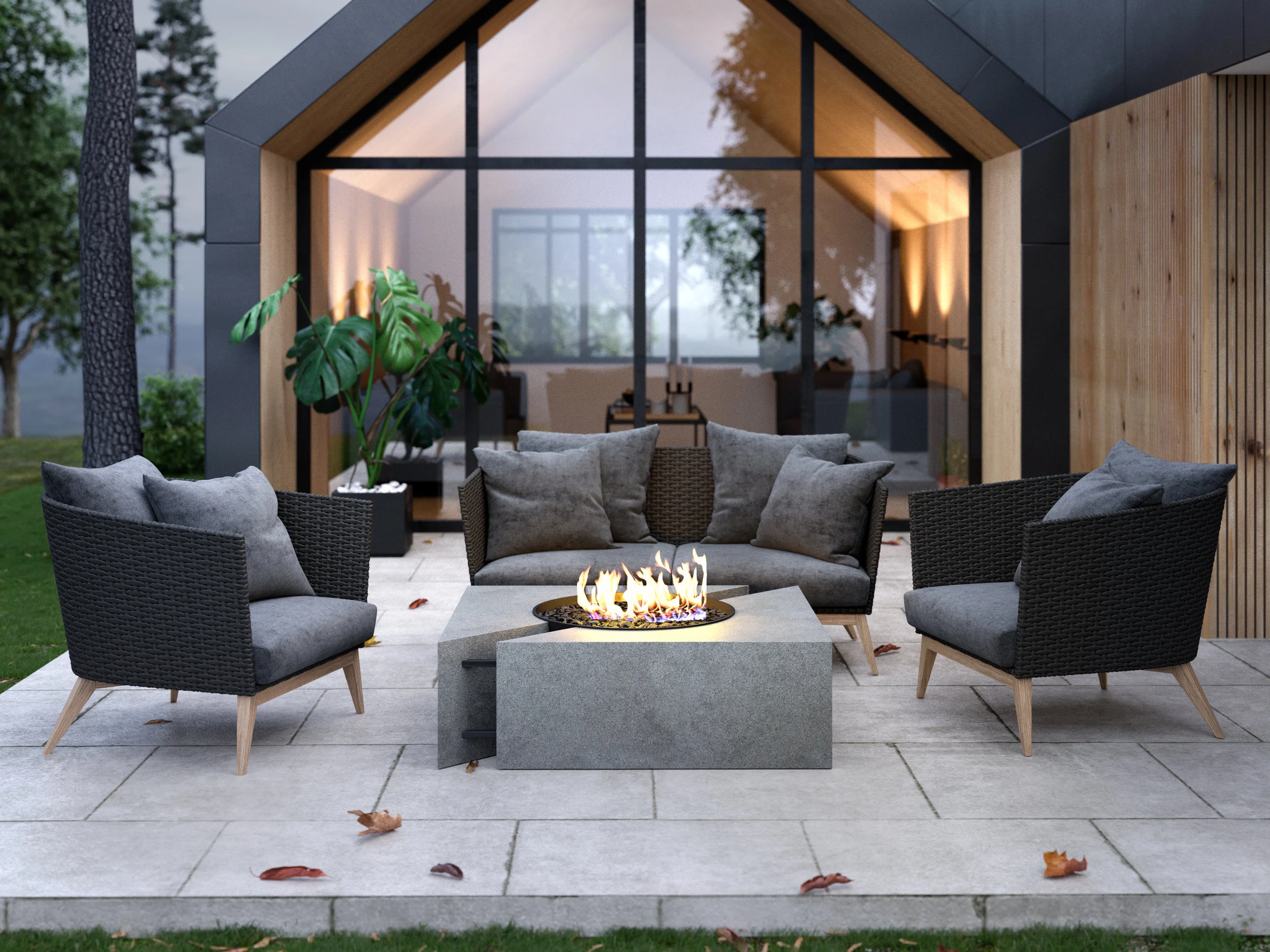 Chaos square fire feature with smoke finish and ceramic orbs on patio