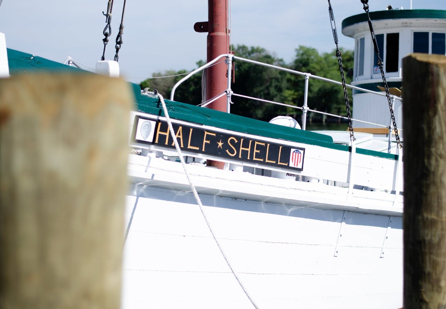  Half Shell’s old quarter board, featuring the Washington, D.C. flag and an oyster shell. 
