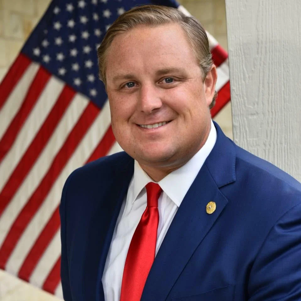 Justin Holland (R)