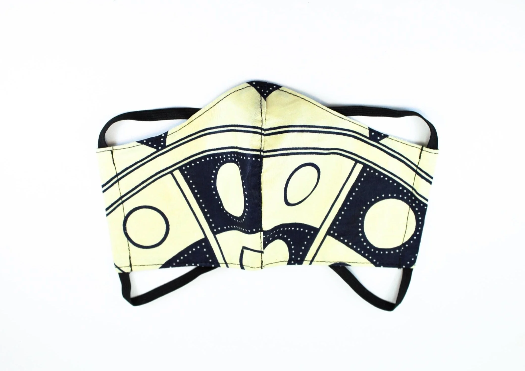 A cream and navy blue face mask