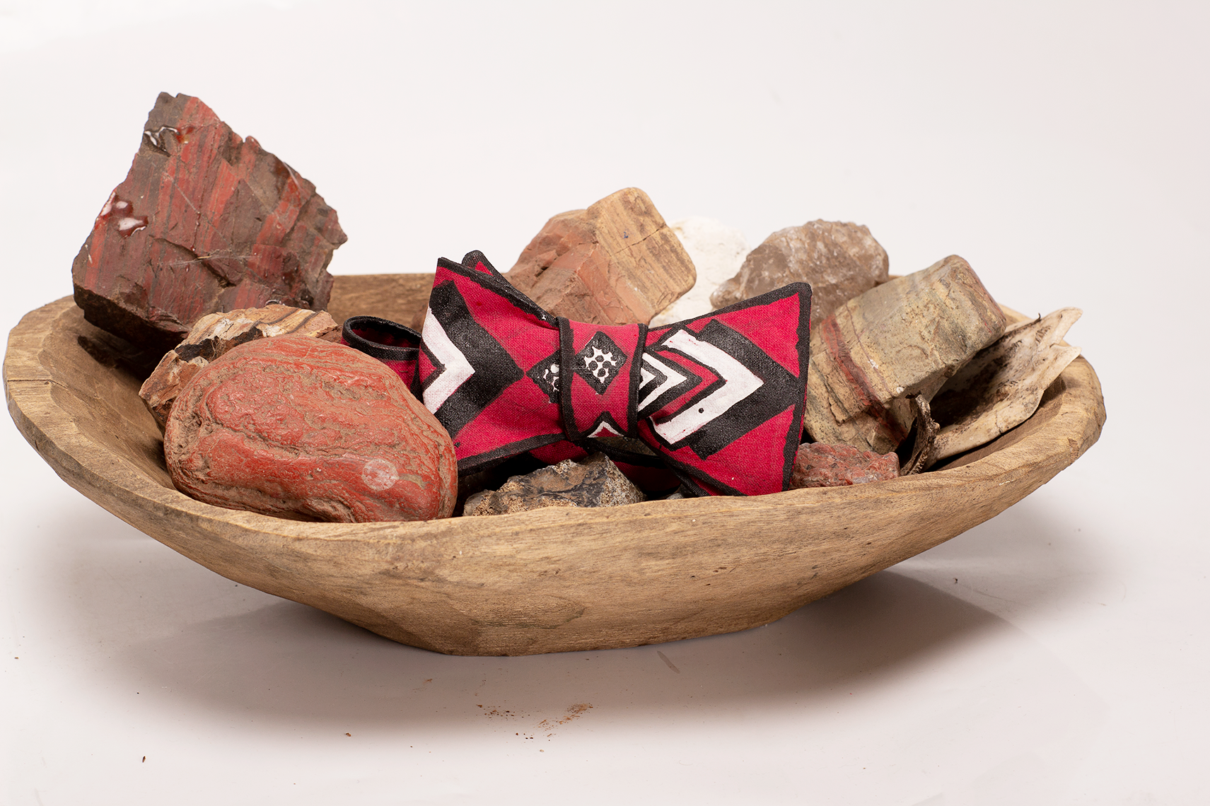 "A Rock of Society" a red, white and black self-tied bow tie handpainted by Bernardo Marira