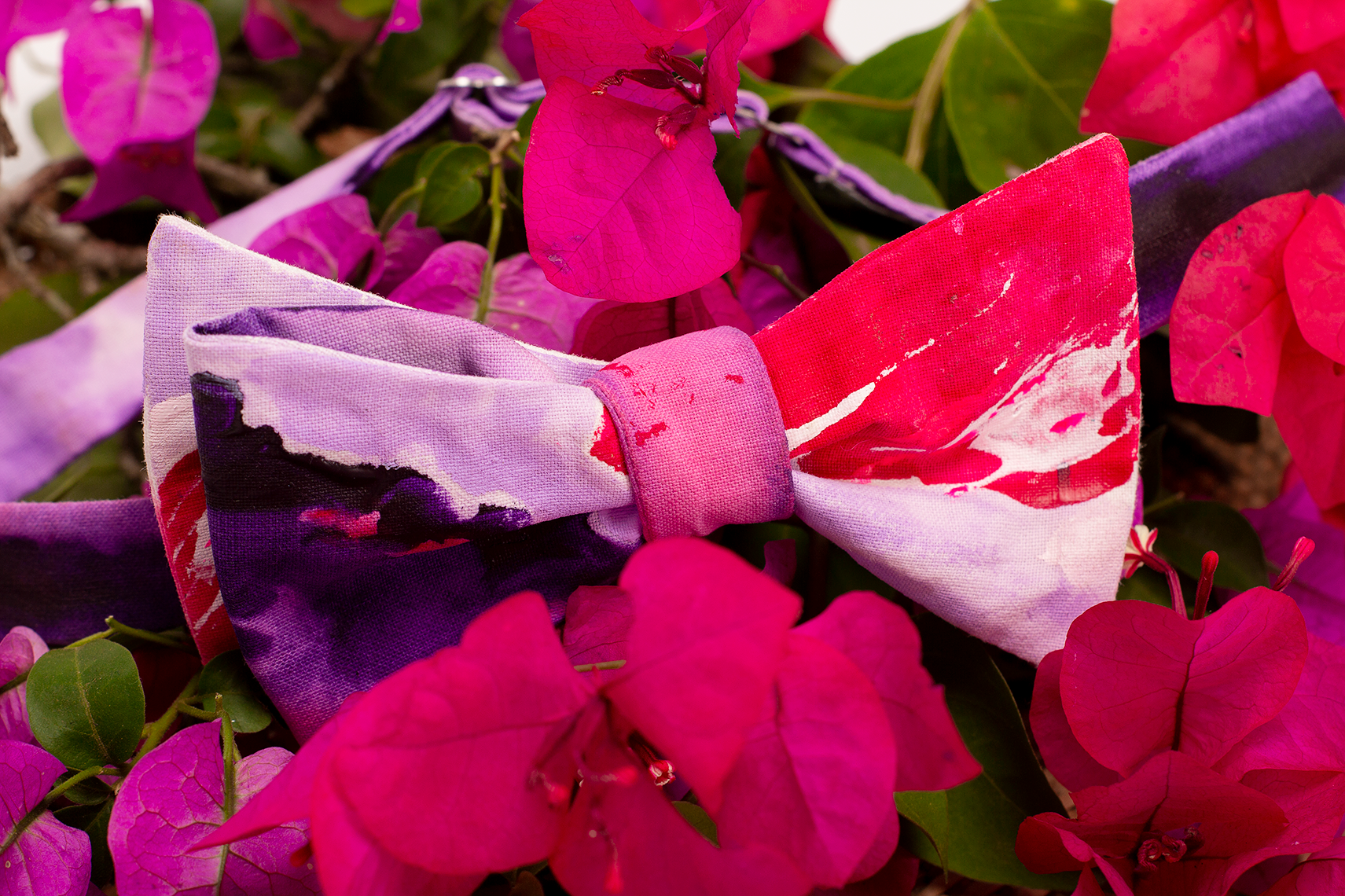 "Spring Colour" a purple and magneta coloured self-tied bow tie handpainted by Lin Barrie