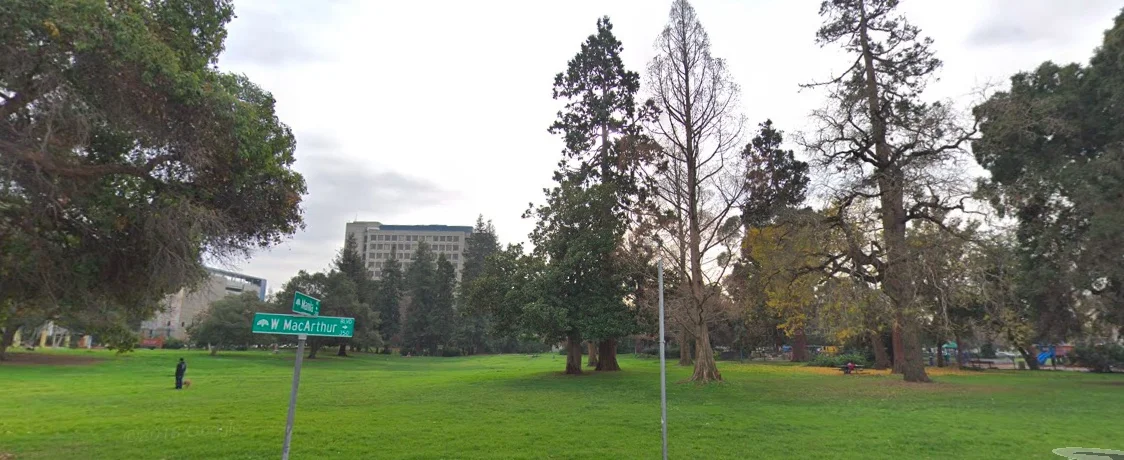 Look for us in the middle of this grassy area near the park BBQ grills.