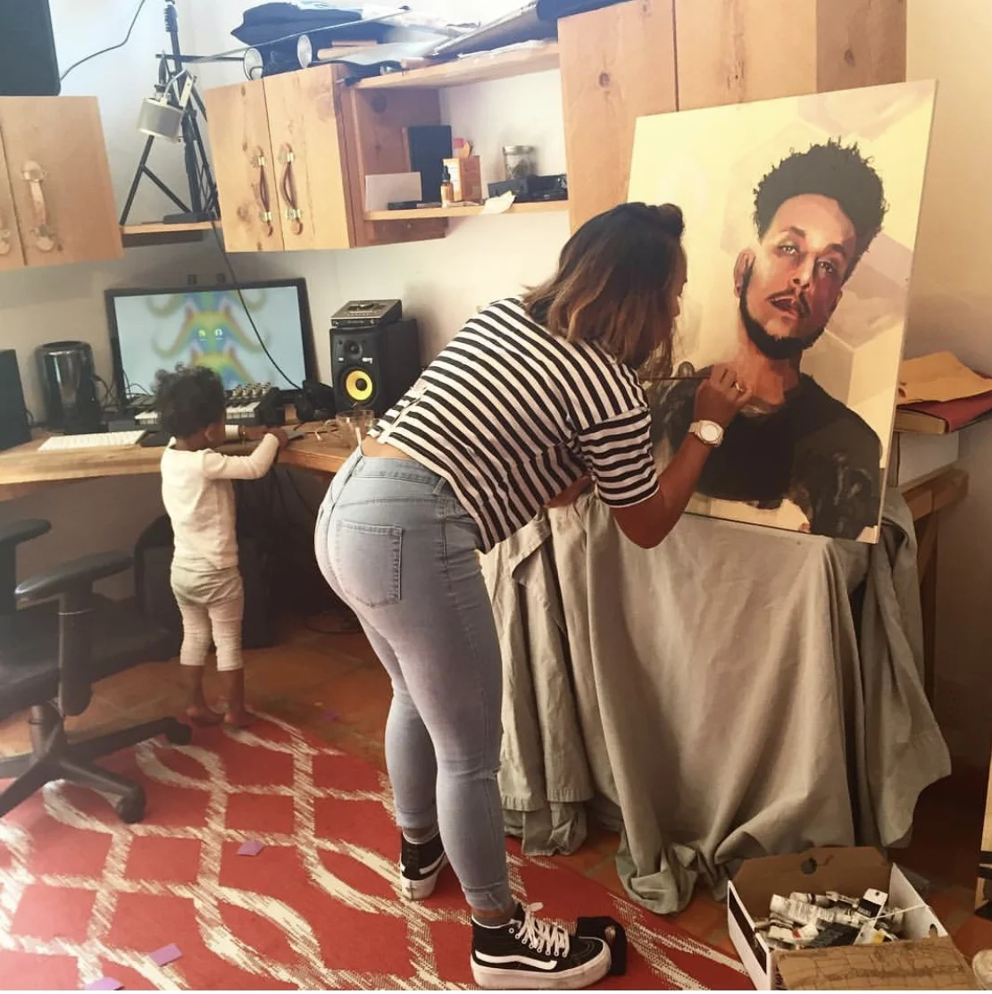 In the studio adding last minute details, with my tiny assistant.