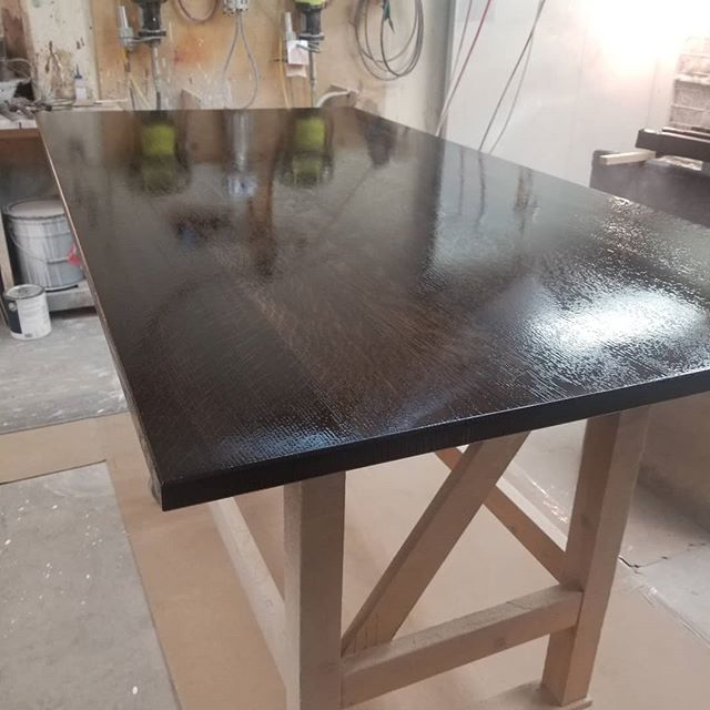 First coat of lacquer freshly sprayed on this quarter sawn white oak table top. It'll be ready for final assembly in the morning, then off to the showroom!
.
.
.
Homestead Cabinetmakers 
www.welovewoodworking.com 
Custom Furniture &amp; Cabinetry mad