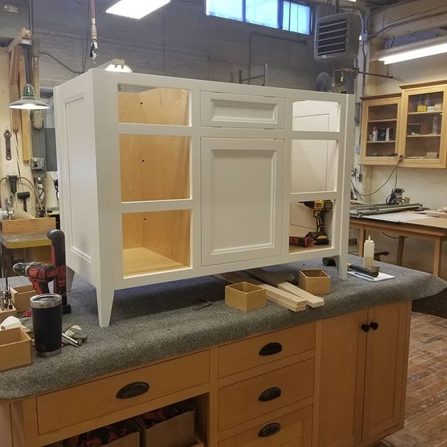 Our shop mate @tom_debrie is putting together this classic legged bathroom vanity. Legs&gt;feet. It's a fact.
.
.
Homestead Cabinetmakers 
www.welovewoodworking.com
Custom Furniture &amp; Cabinetry made in downtown Kalamazoo, Michigan
.
.
Looking for