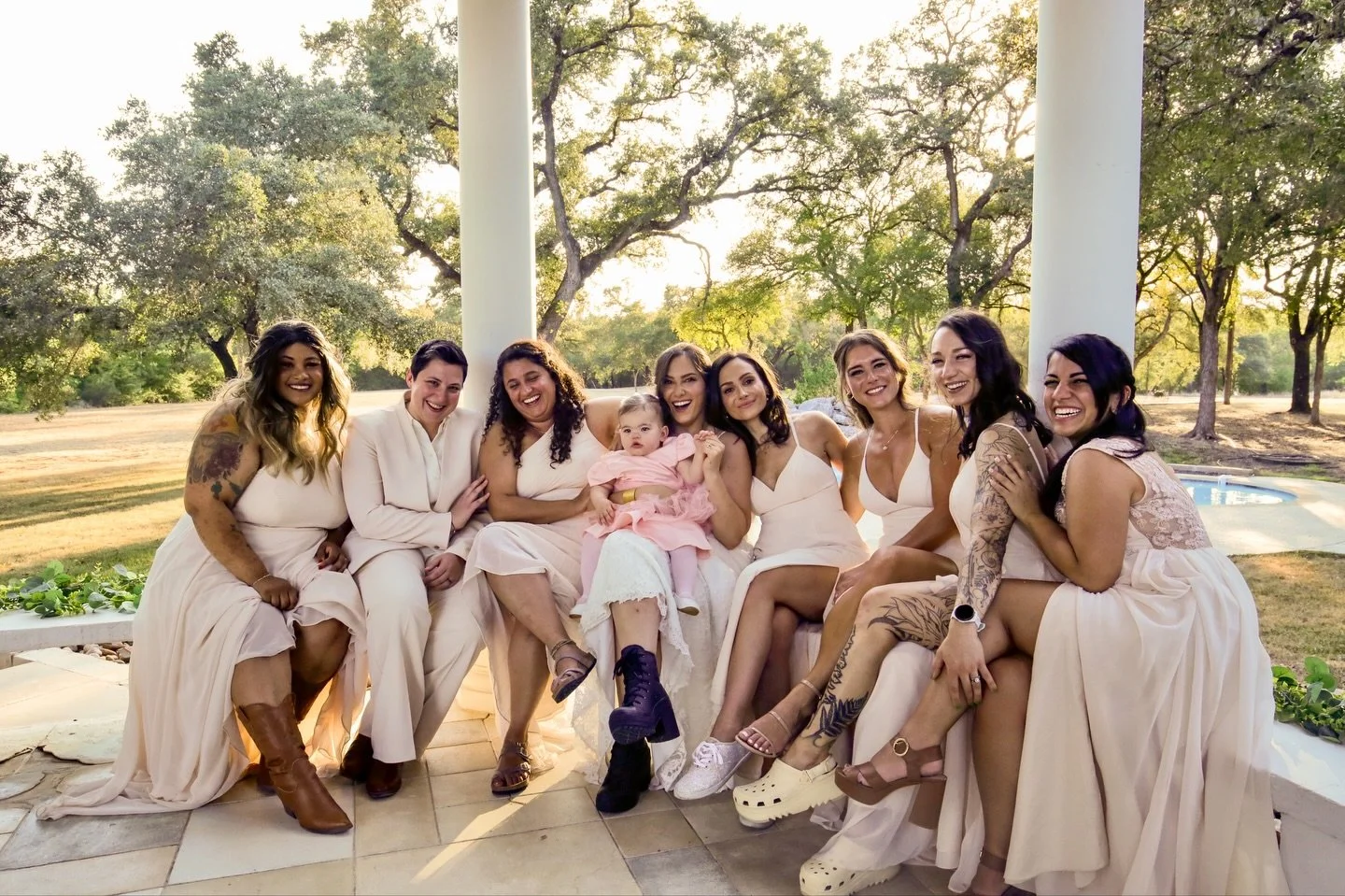 The bridesmaids are a burst of sunshine&mdash;laughing, teasing, and striking silly poses between the serious ones. They fuss over the bride one moment and dance around the room the next, filling every second with genuine happiness. With every giggle