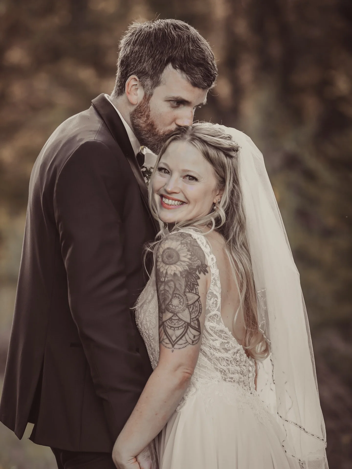 Melanie+Chase 

In couple portraits shaped by a cinematic tone, the image feels less like a photograph and more like a suspended moment from an untold story. Light falls deliberately&mdash;soft, directional, almost reverent&mdash;carving out the quie