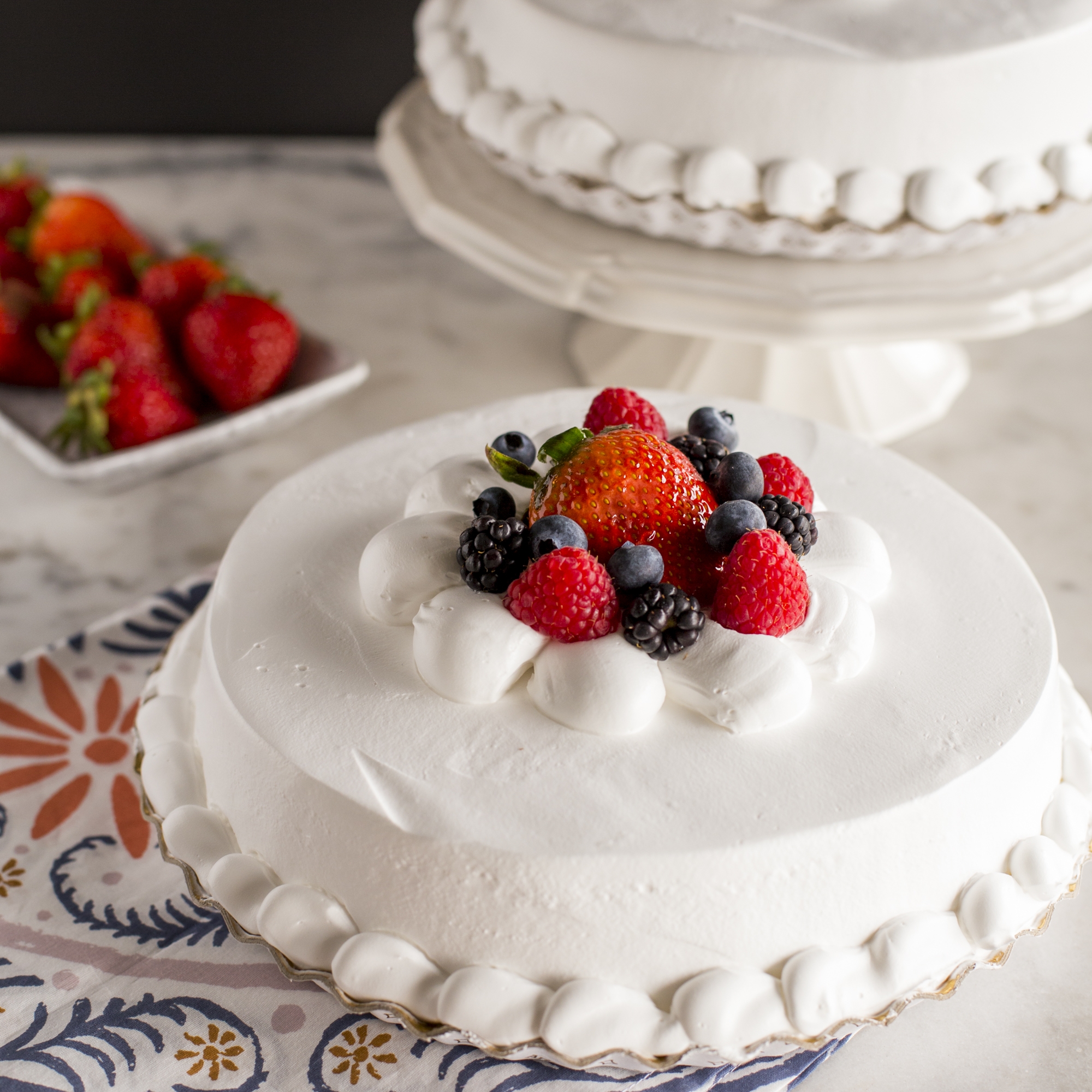 Katella Bakery specialty cake with fresh berries