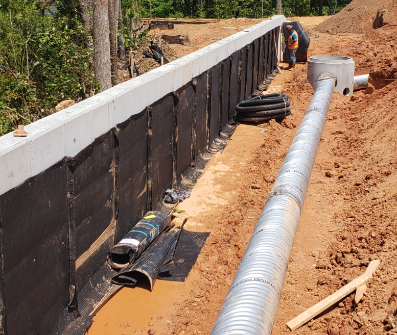 Retaining Wall Awd American Wick Drain - Do You Have To Put Drainage Behind A Retaining Wall