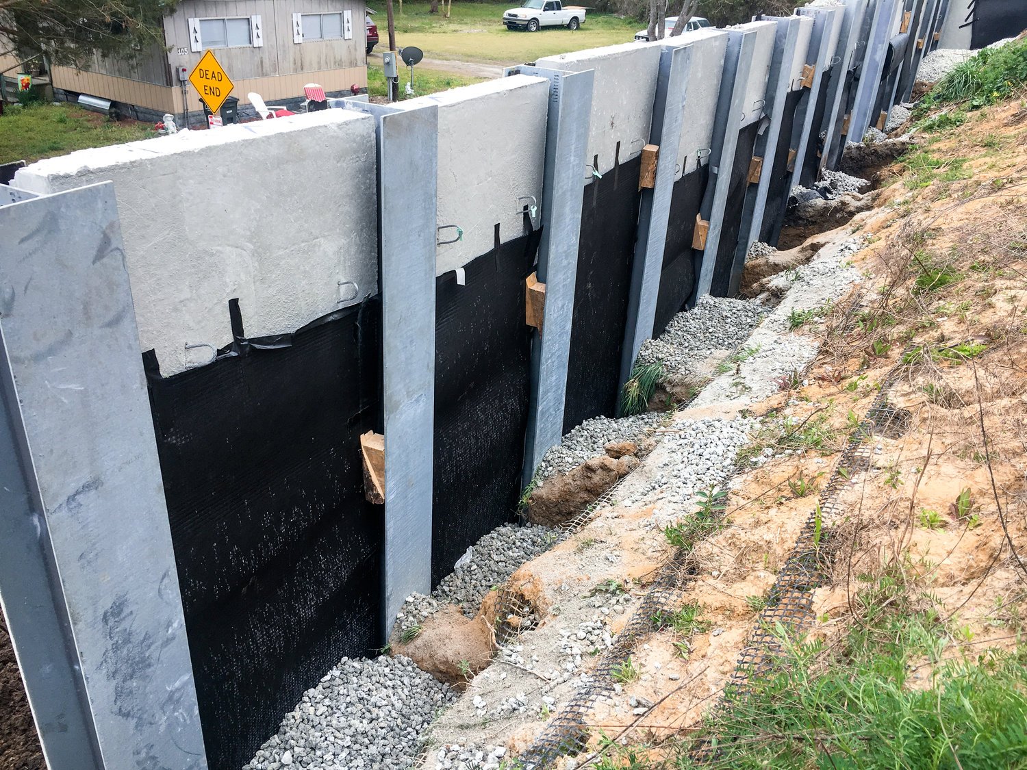 Soldier Pile & Lagging Wall — AWD - American Wick Drain
