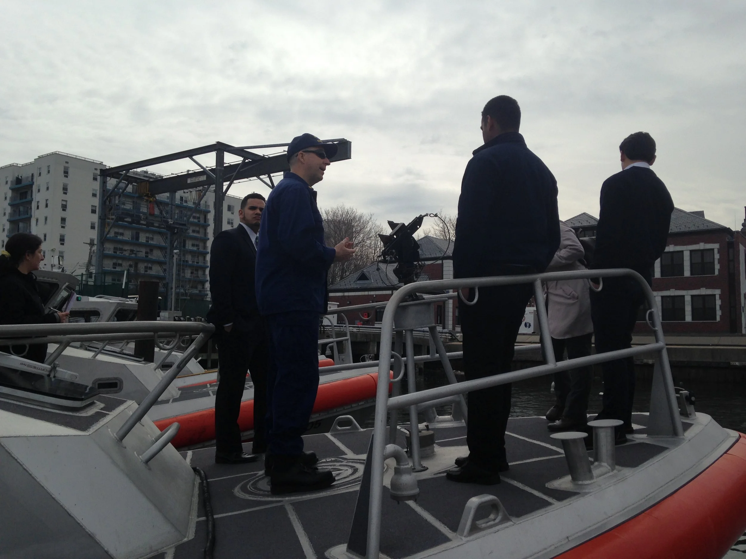 On Board a Response Boat: Steven Fernandez, Lt. Cmdr. Walsh, Luis, Waleska, Brendan.