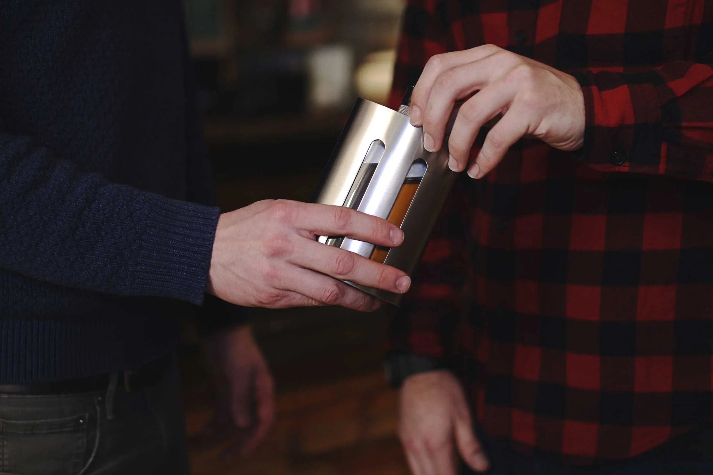 Friends-passing-Fusion-Flask-and-sharing-drinks.jpg