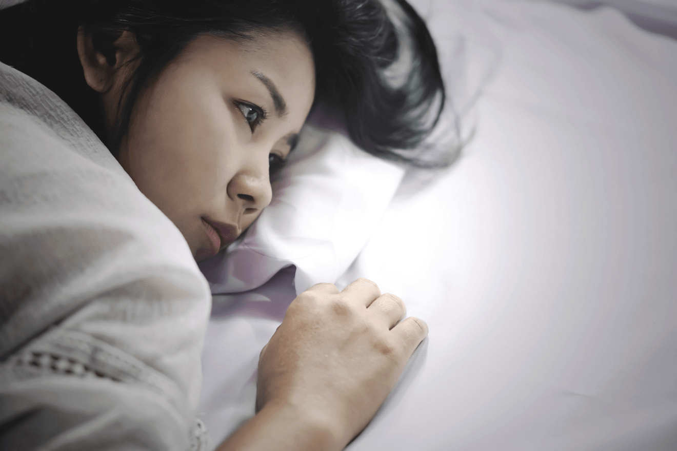 depressed woman-in-bed.png