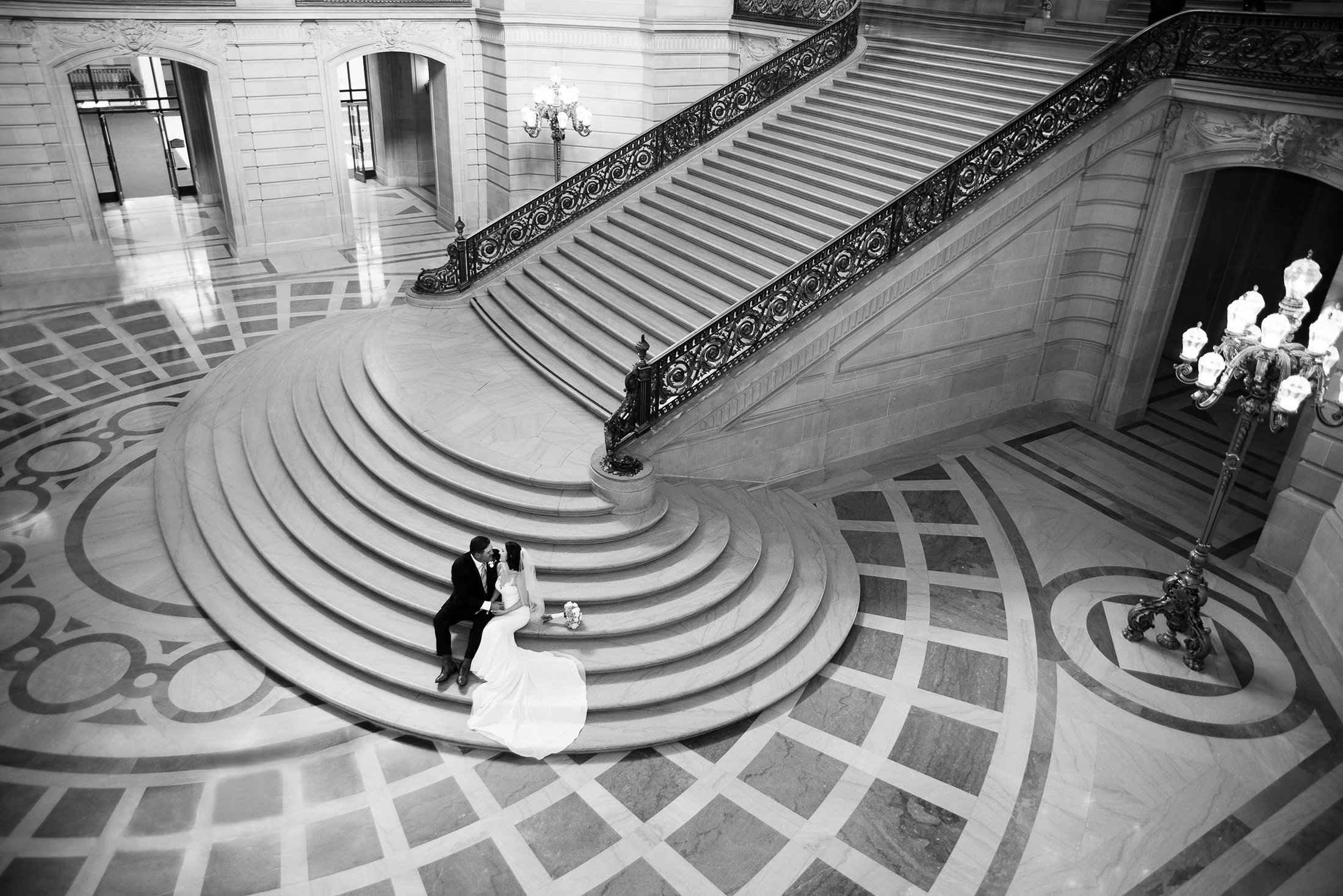 Sitting on the steps at San Francisco City Hall