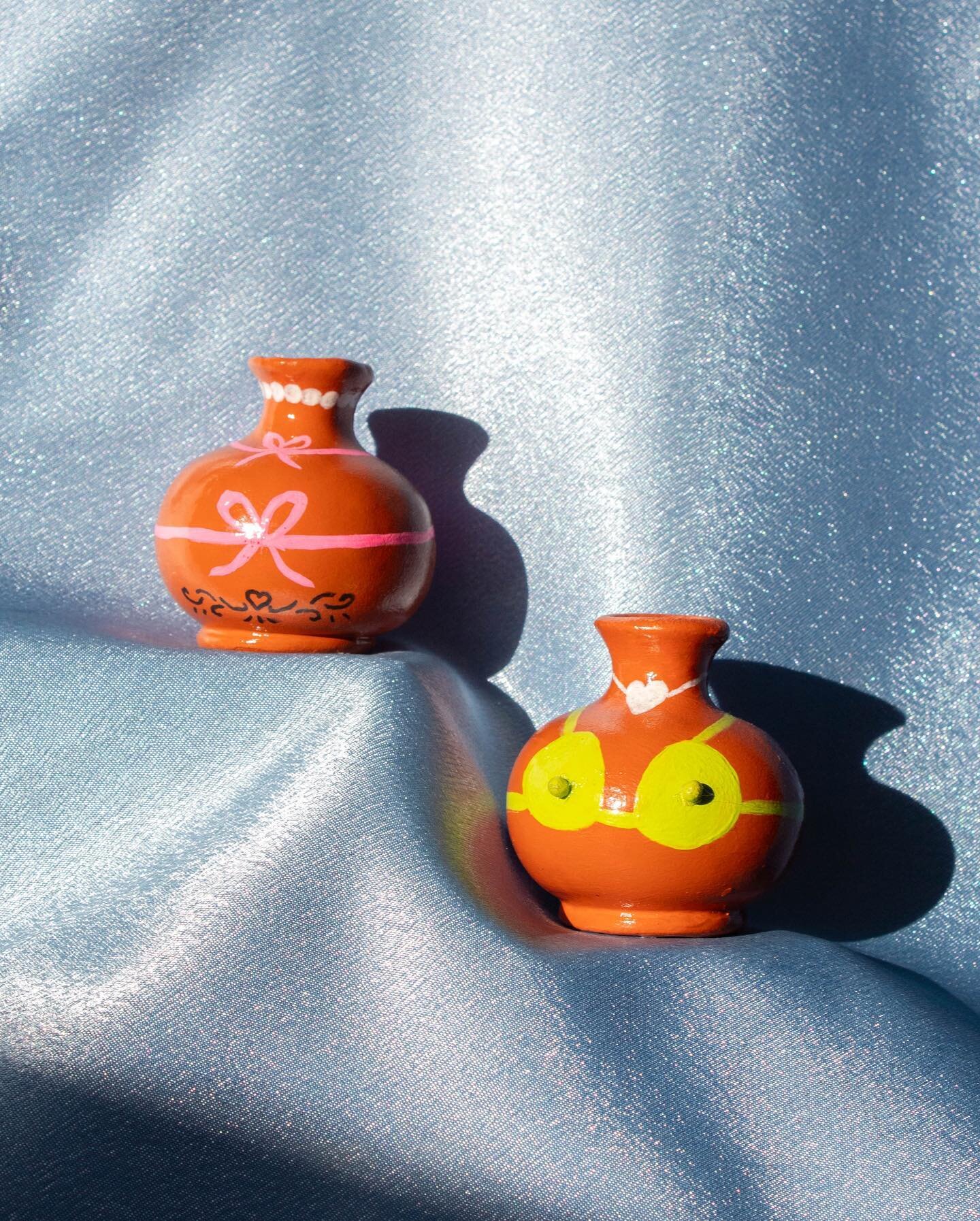 Little terra cotta bikini babe vases with lower back tattoo included. Pink one has sold but green is still available for those interested in purchasing. Small teeny tiny little art is not only great for the home but also good for the soul, so I have 