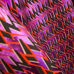Dakota Purplehaze is a geometric design with 80s inspiration. A bright purple lurex with black and red accents